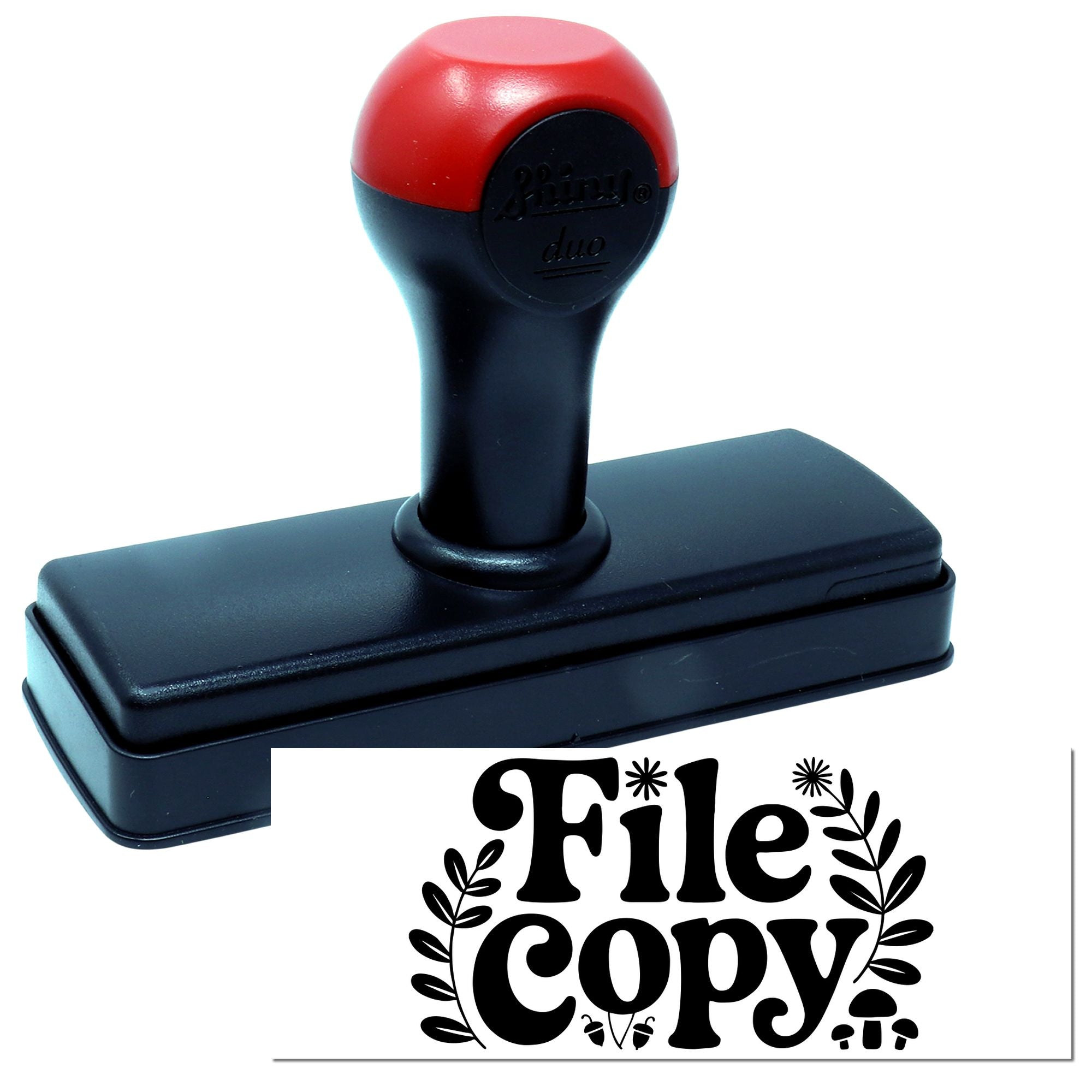 Red and black self-inking stamp and seal with a File Copy impression and decorative leaf design.