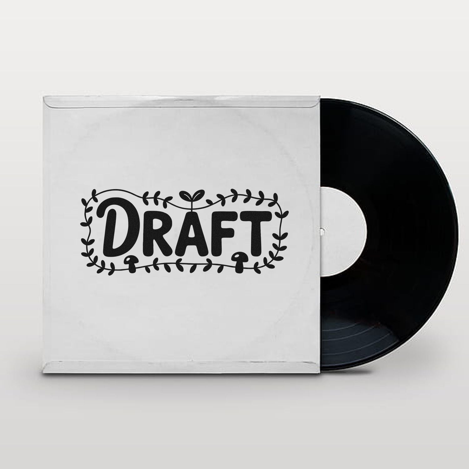 White stamp and seal package with black DRAFT logo and leafy border beside a black vinyl-style disc.