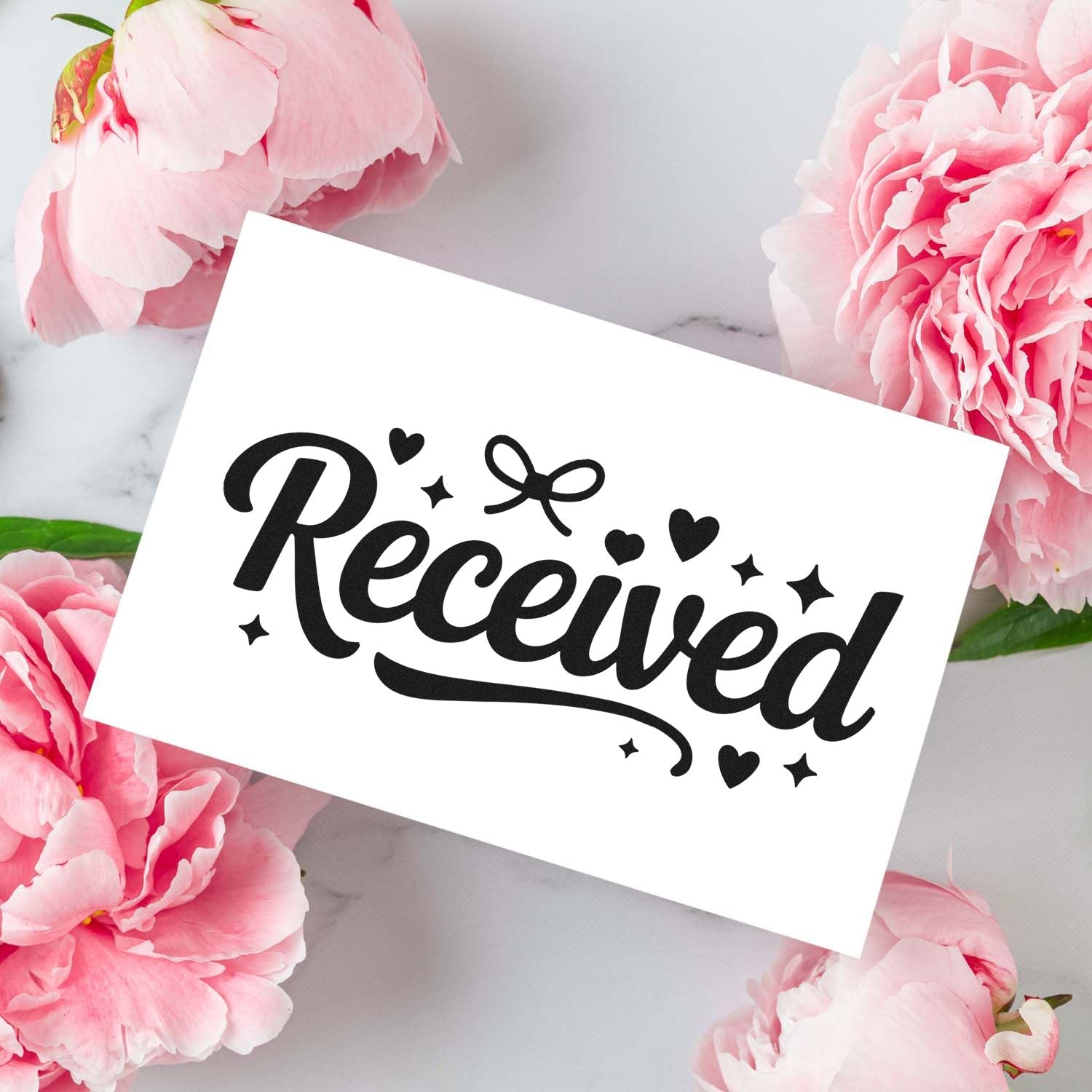 Black Received stamp and seal design on white card, surrounded by pink peonies, hearts, stars, and a bow.