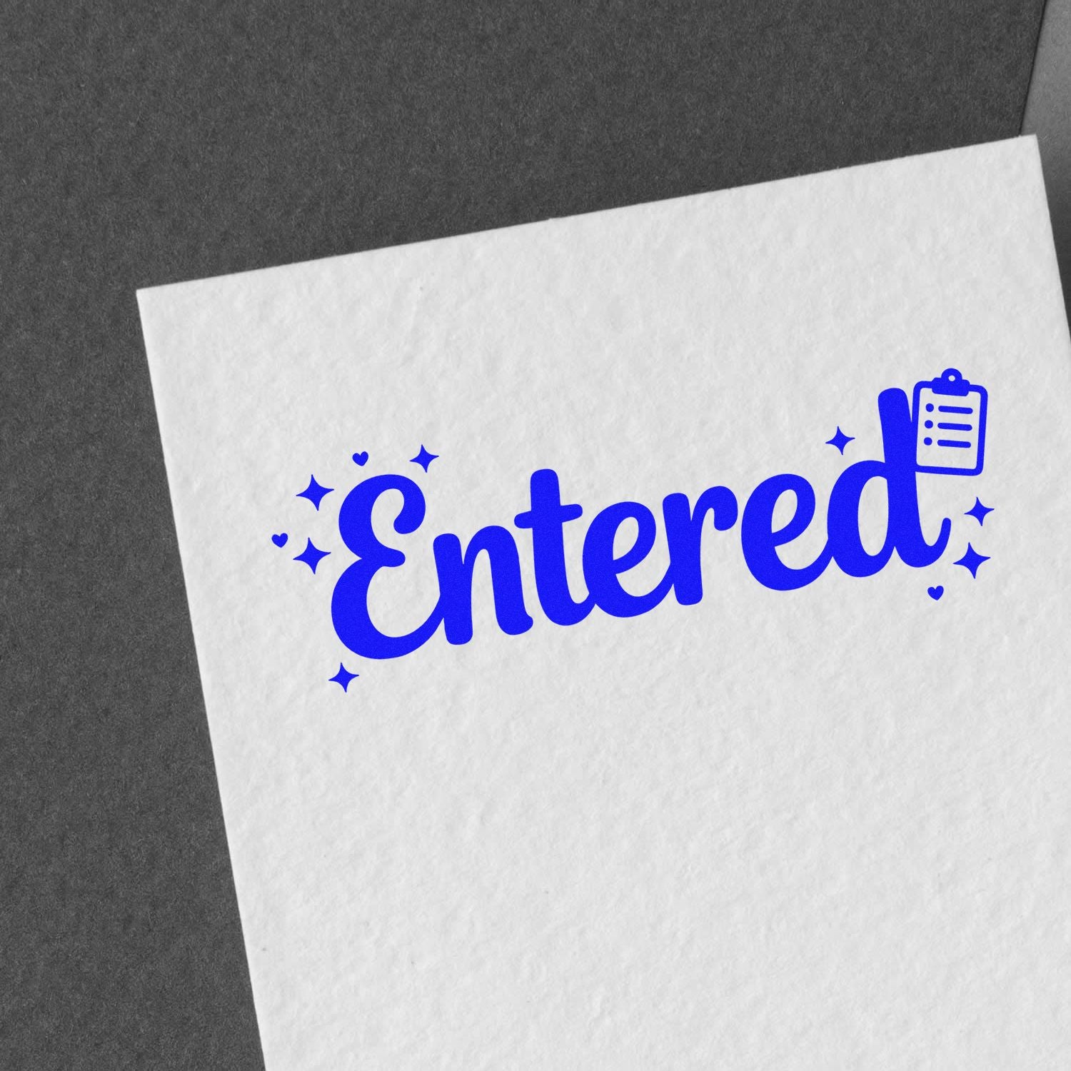 Blue Entered stamp seal with clipboard icon and sparkles on white paper against a dark background.