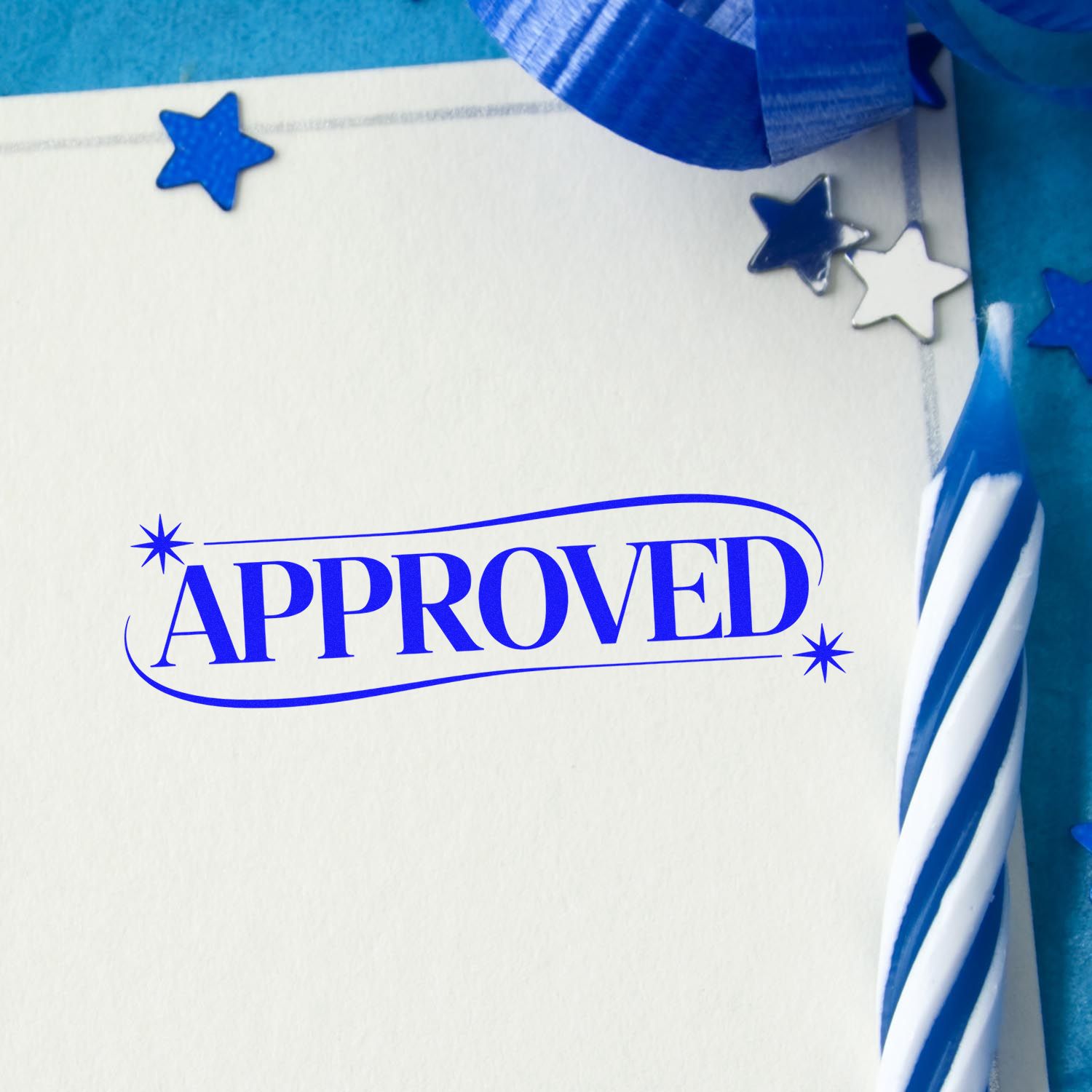 Blue APPROVED stamp with star seal accents on white paper, framed by blue ribbon and striped seal