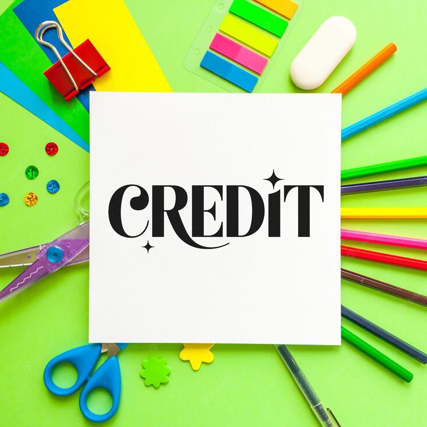 Credit word stamp on white paper surrounded by colorful office supplies, ideal for custom stamp and seal branding, office organization, and business use.