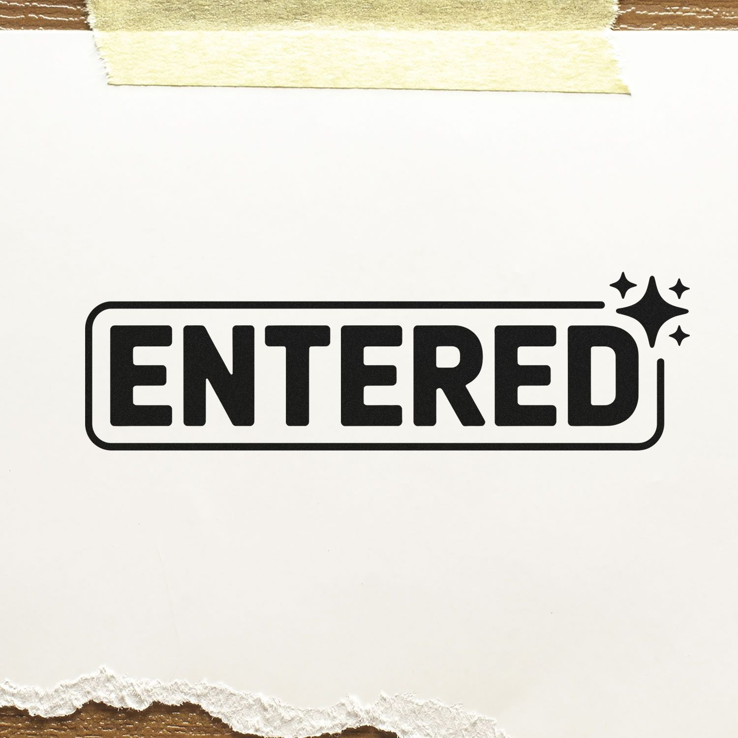 Black ENTERED stamp seal on white paper, framed in a rounded border with sparkle icons and masking tape accents.