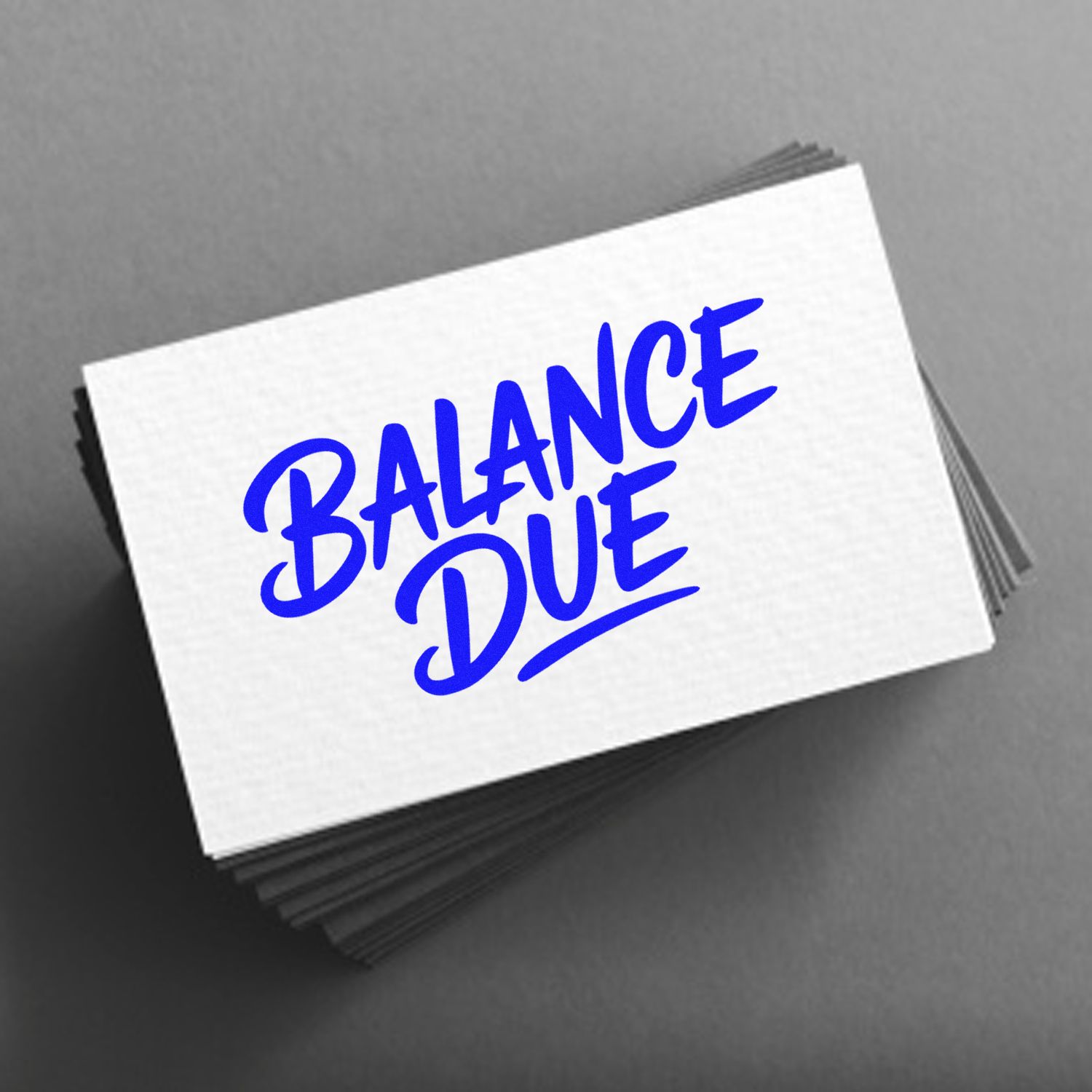 Blue Balance Due stamp on stacked white seal cards against a gray background.