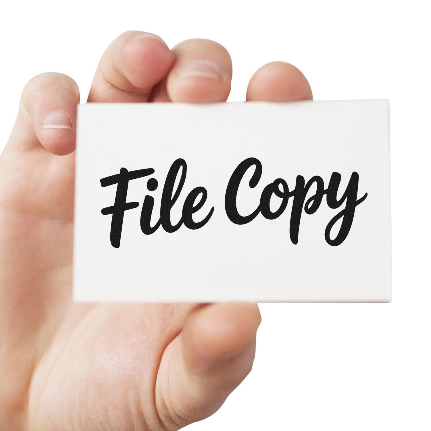 Hand holding white office stamp or seal with black File Copy text on a clean white background