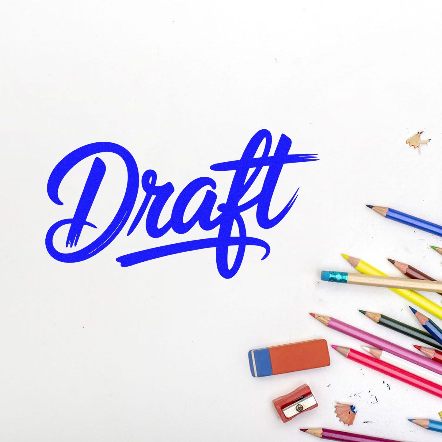 Blue Draft rubber stamp and seal design with colored pencils, eraser, and sharpener on white background.