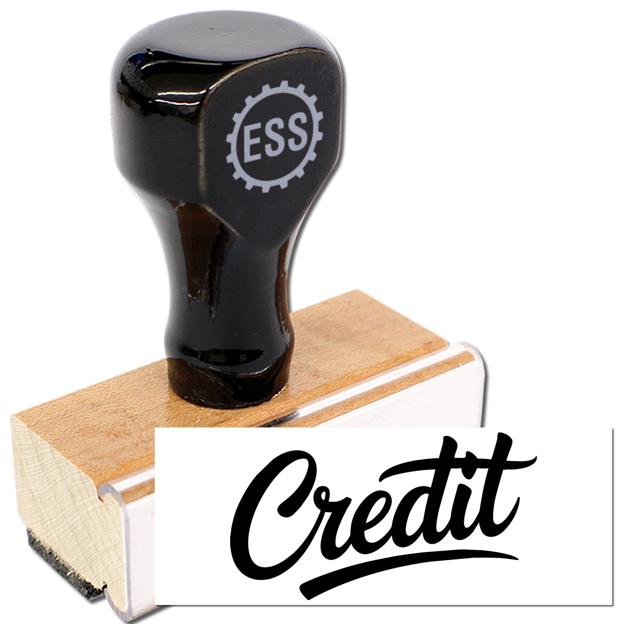 Black ESS stamp and seal product on a wooden block, with white card showing Credit in bold script.