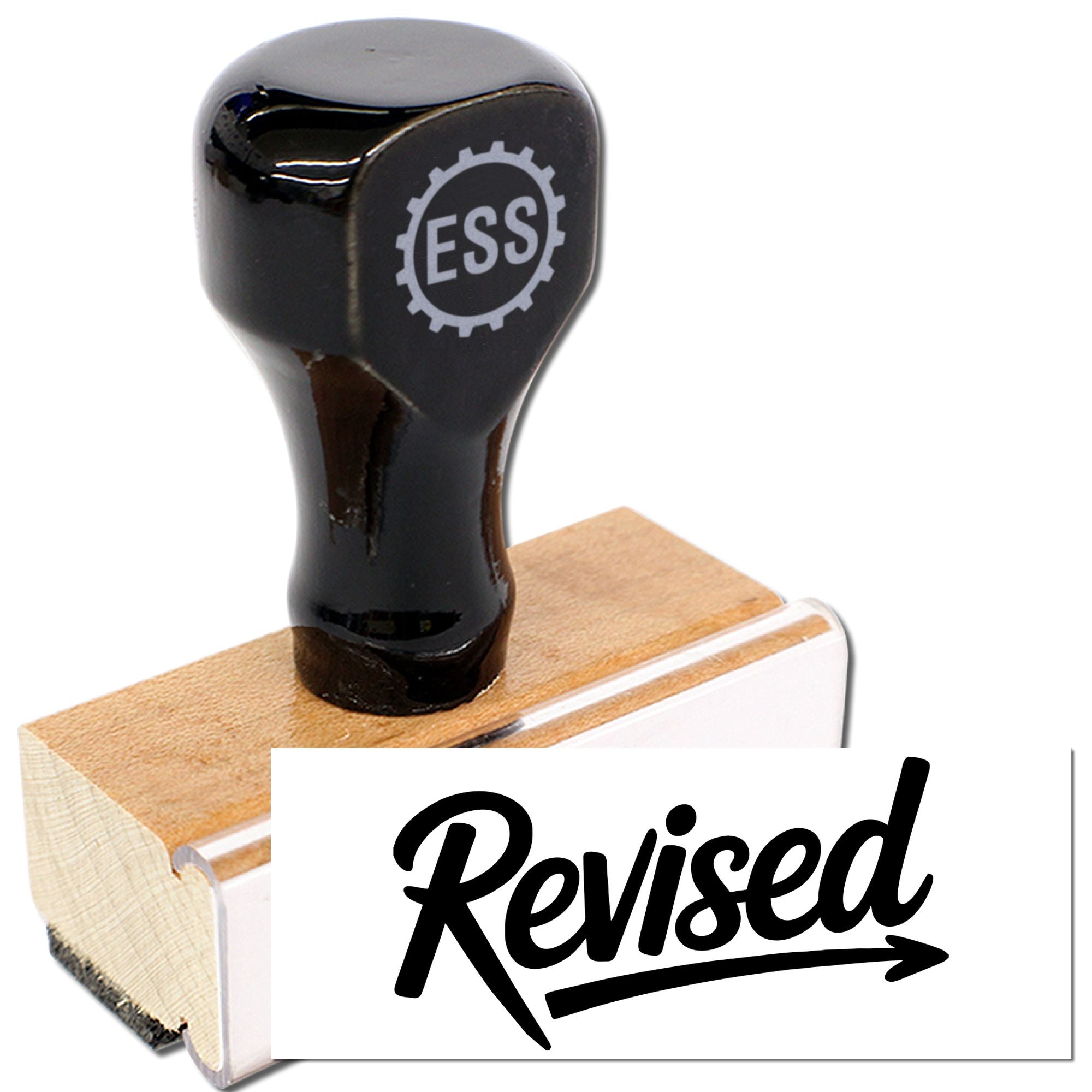 Black ESS rubber stamp and seal on wooden block with white Revised imprint label