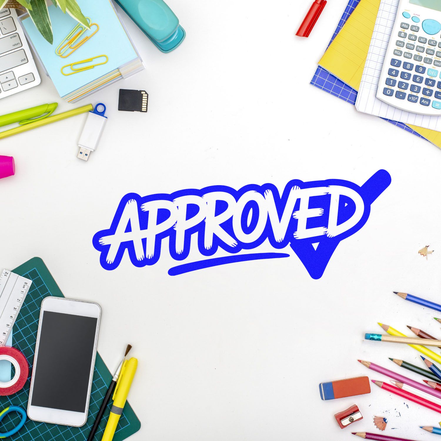 Blue APPROVED stamp seal on white desk, surrounded by colorful stationery, calculator, pens, notebooks, and phone.