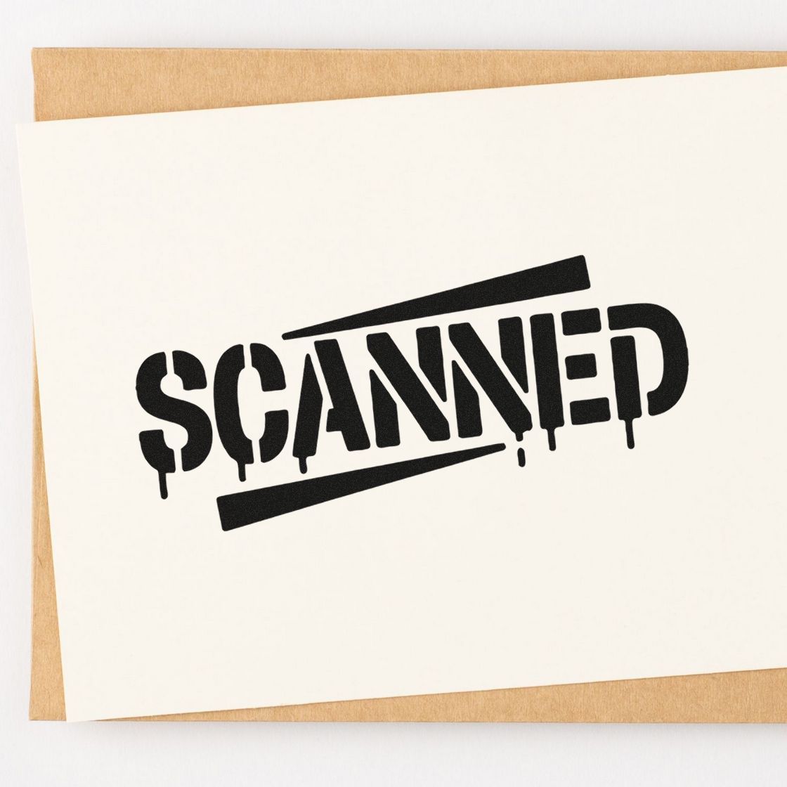Black SCANNED stamp seal on a white card over kraft paper background