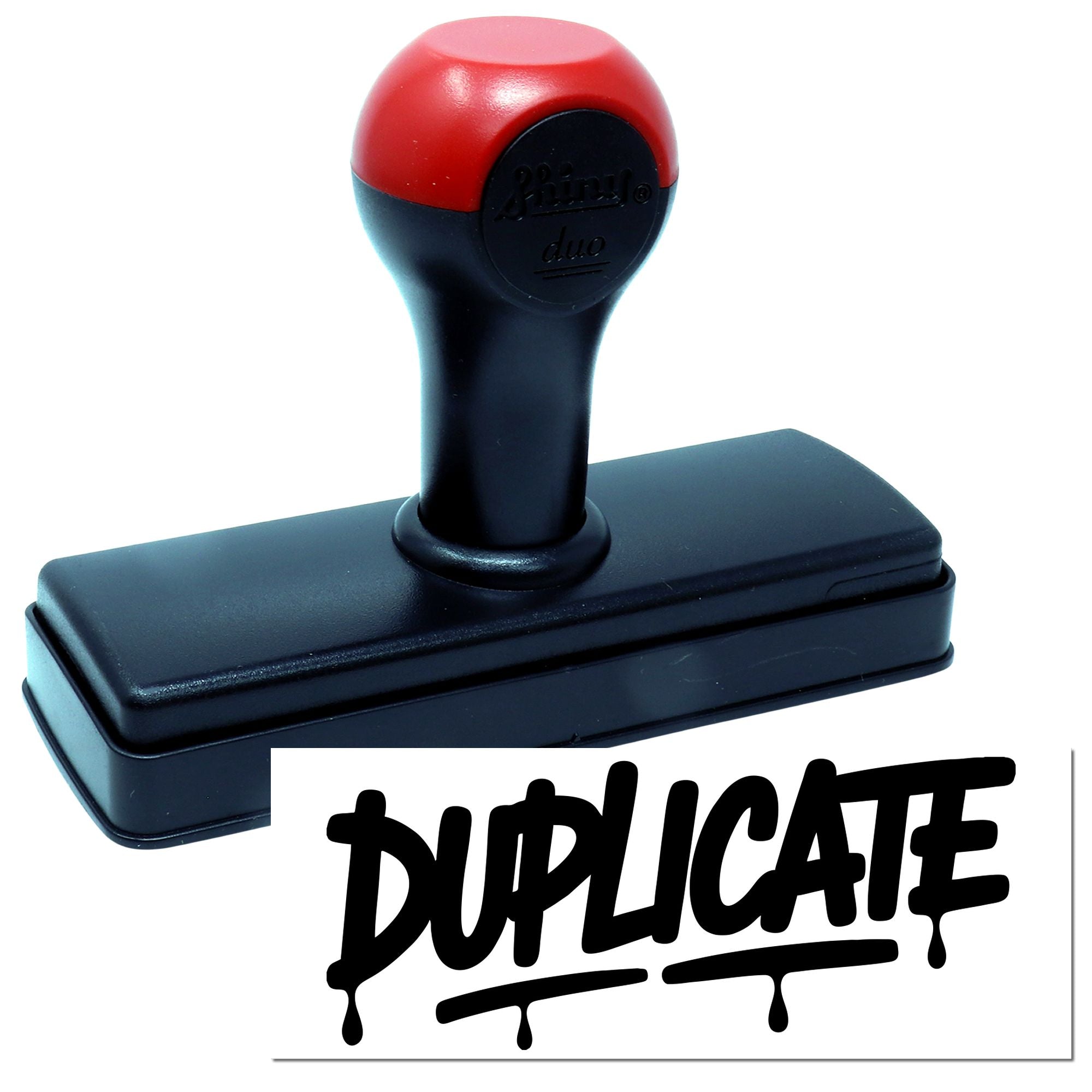 Red and black self-inking duplicate stamp with rectangular black base and bold black DUPLICATE seal imprint.