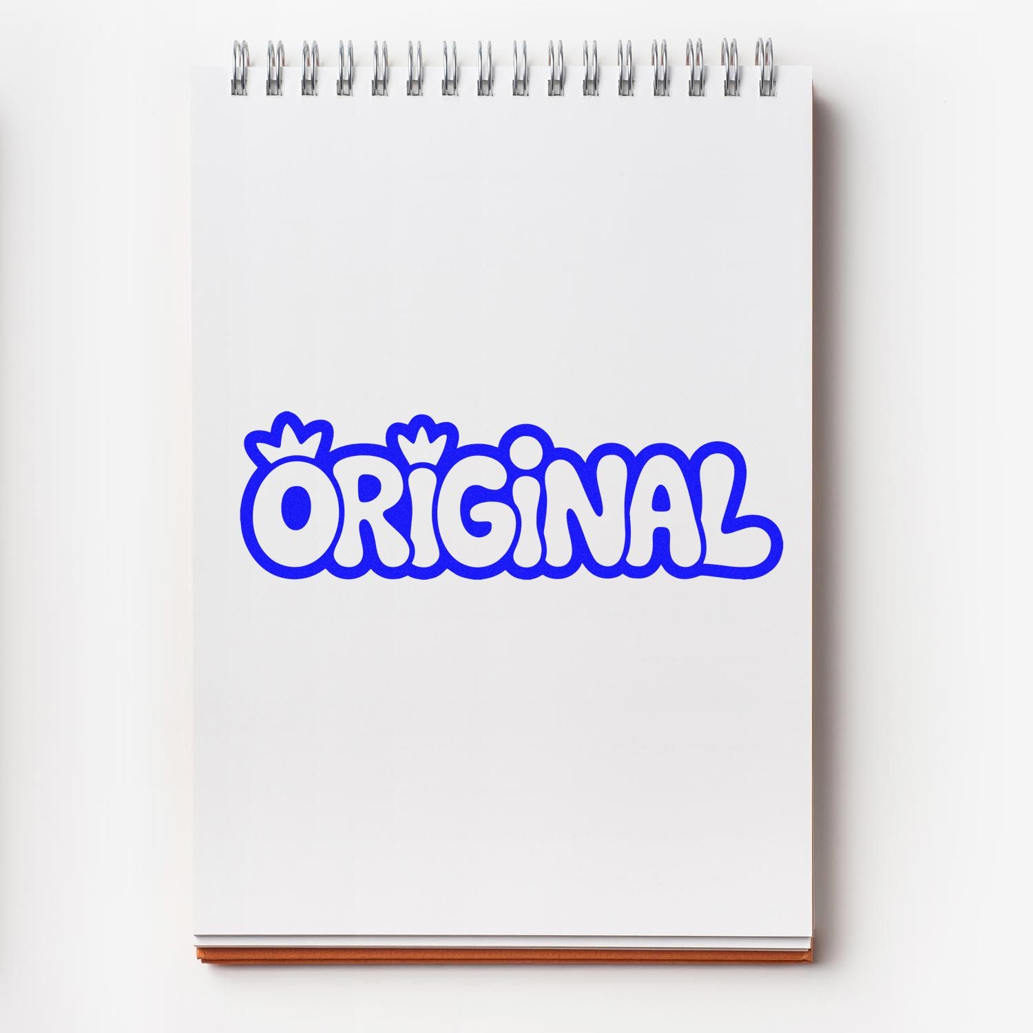 White spiral notebook featuring a bold blue ORIGINAL stamp seal design with bubble lettering