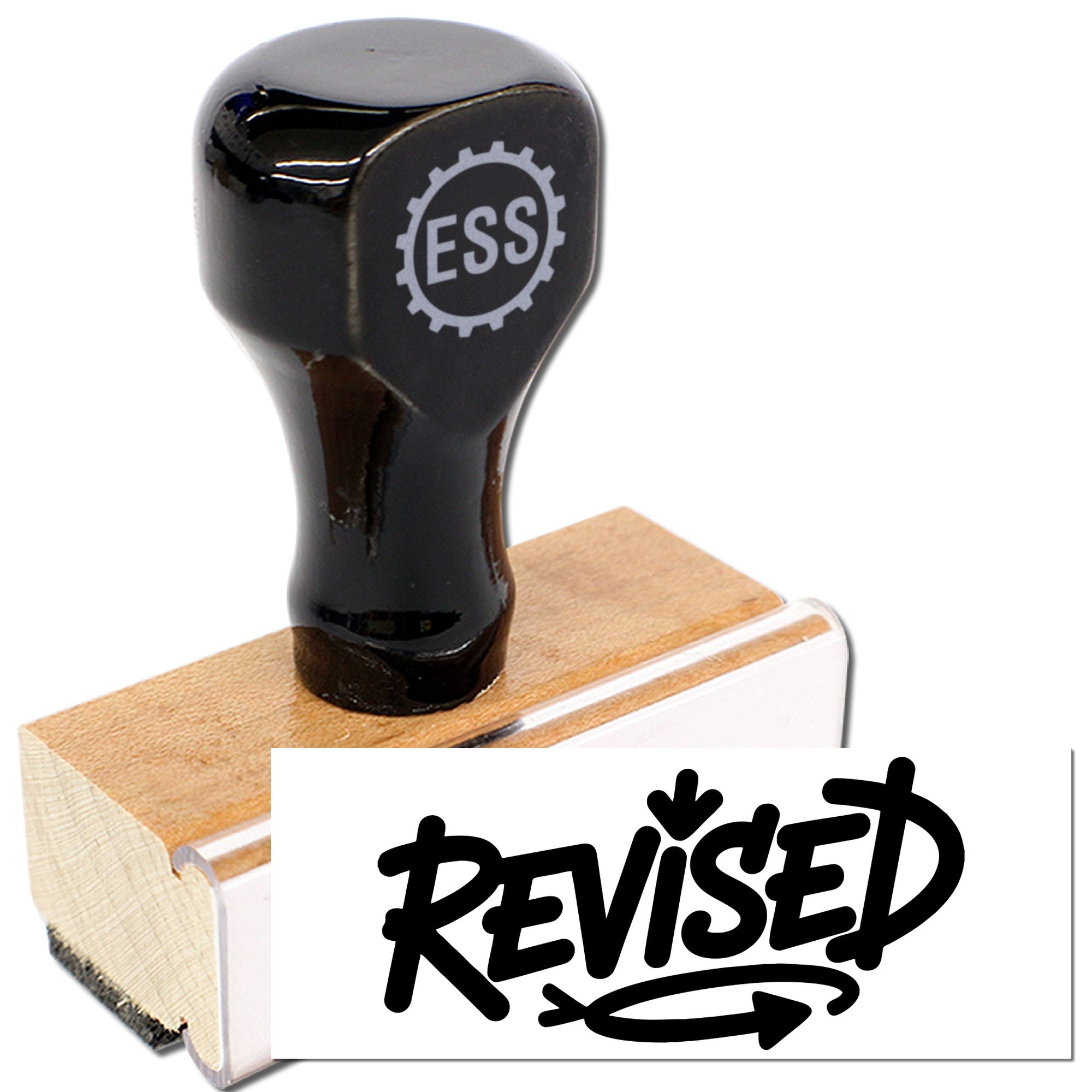 Black ESS rubber stamp and seal on a wooden base with a white REVISED imprint card.