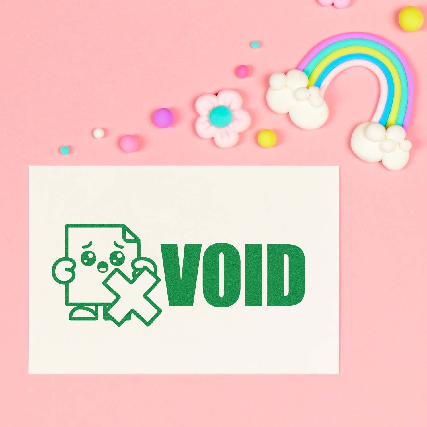 Green VOID stamp and seal on white card with sad document icon, on a pink background with rainbow and pastel dots.