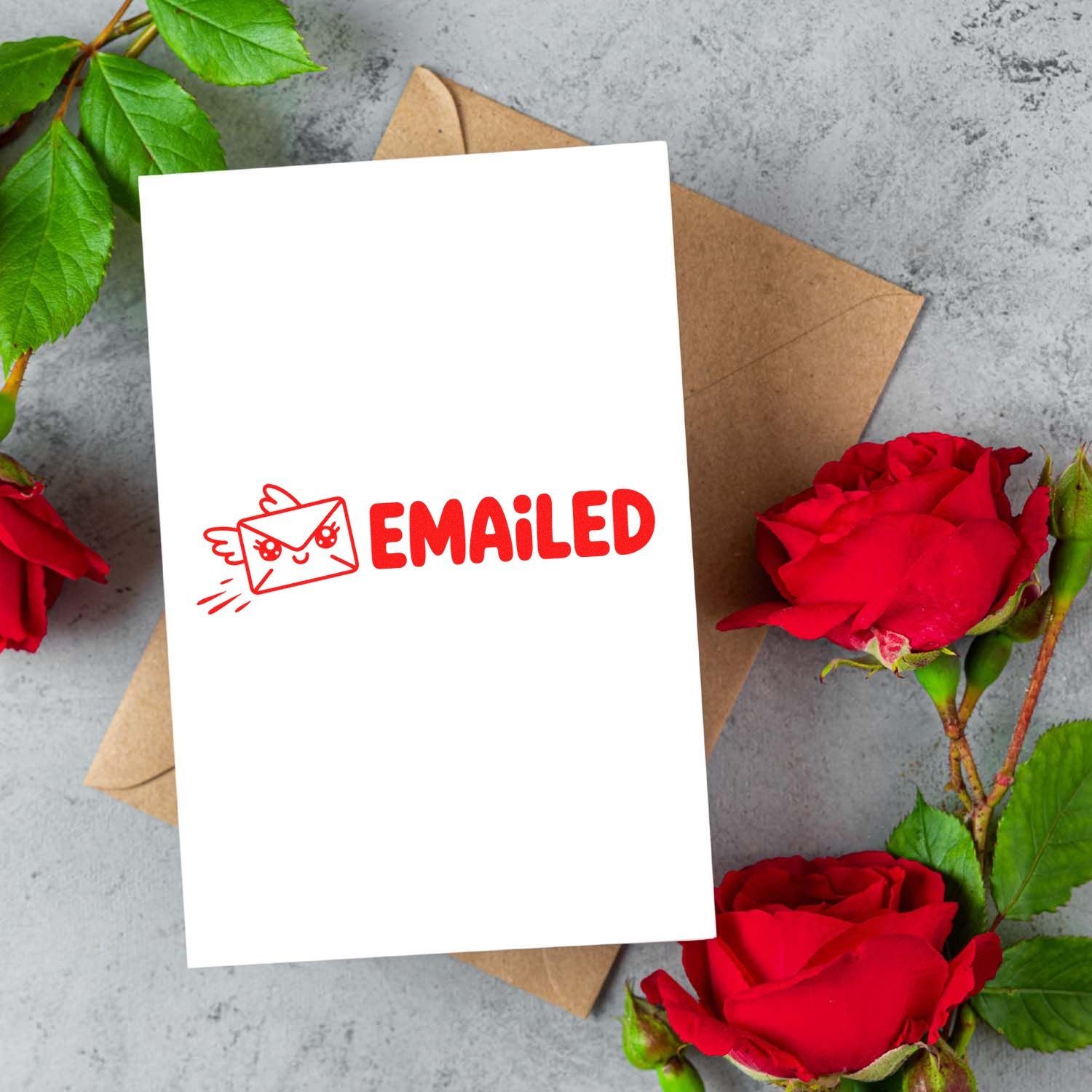 White card with red EMAILED stamp and envelope seal icon on brown envelope, surrounded by red roses and green leaves