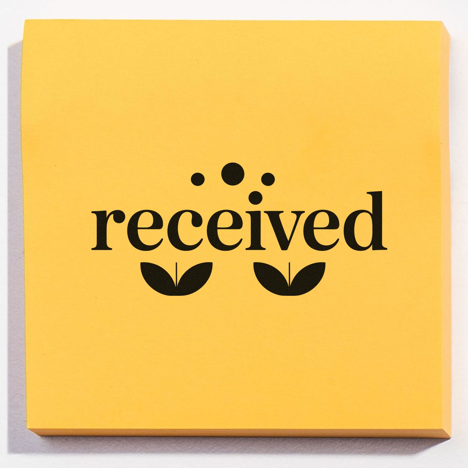 Yellow received stamp pad with black text and leaf seal icons