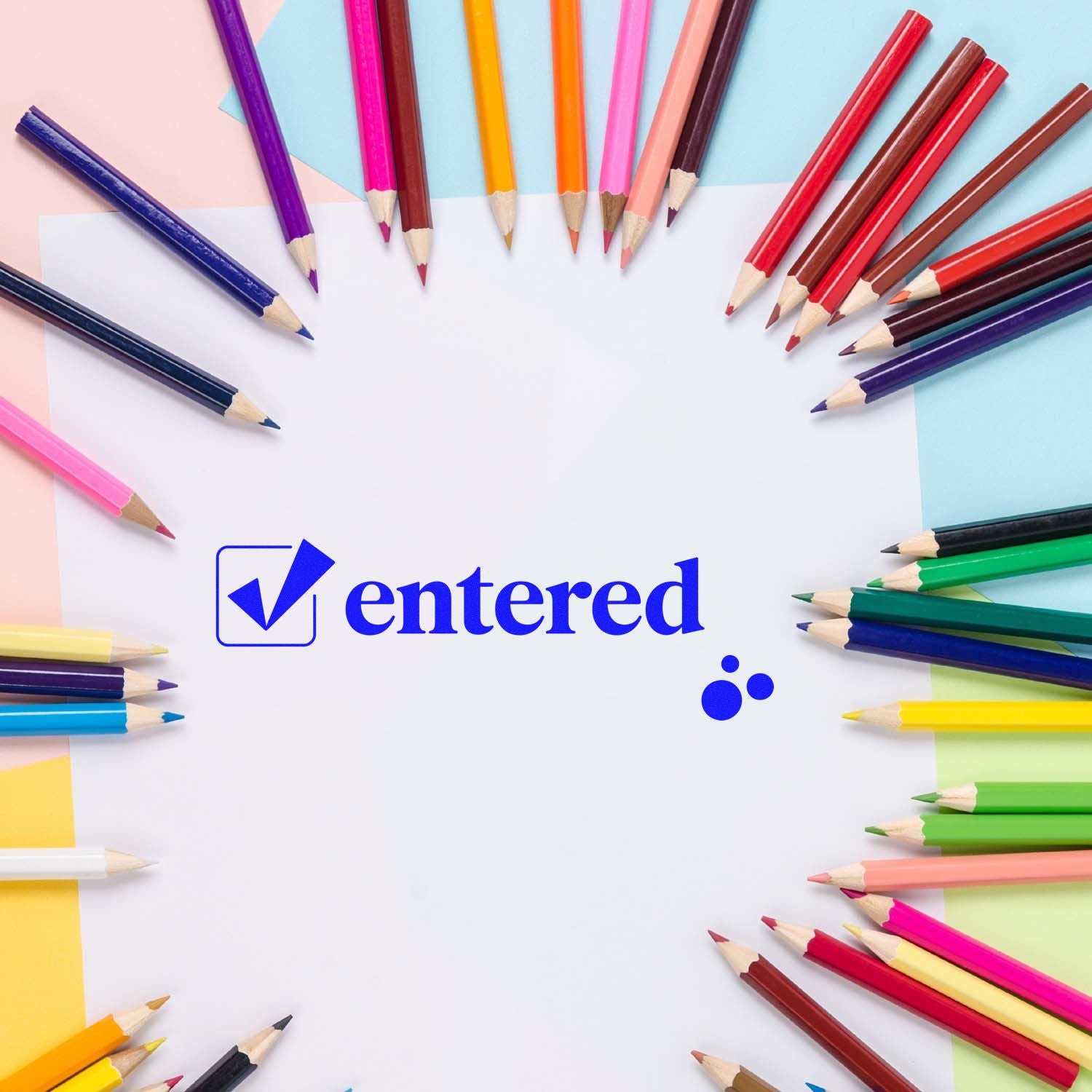Blue entered checkmark stamp seal on white paper, framed by assorted colorful pencils.