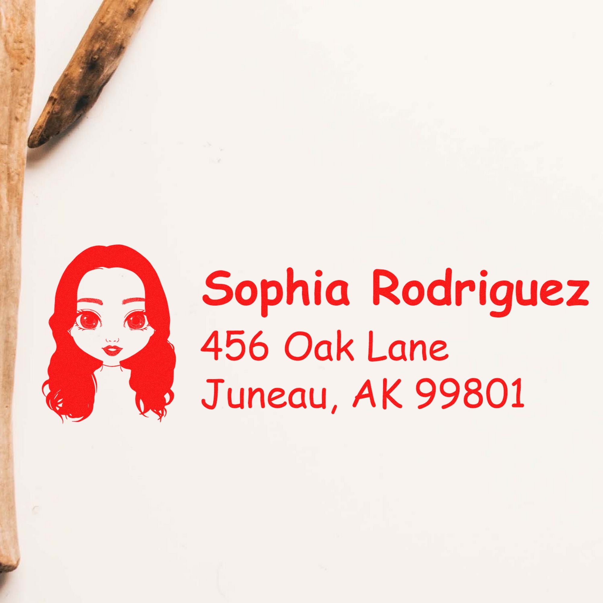 Red custom stamp seal with girl icon, Sophia Rodriguez, 456 Oak Lane, Juneau, AK 99801 on white paper.