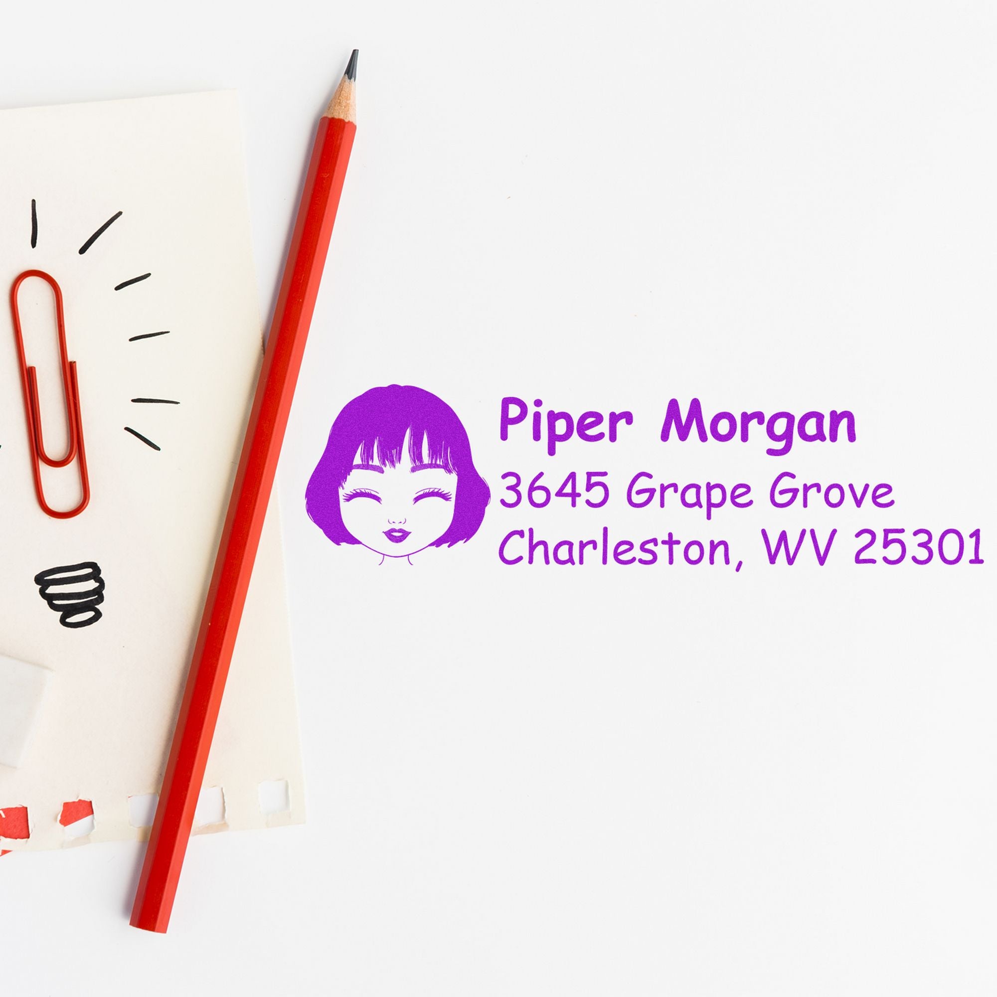 Purple address stamp seal with girl icon, red pencil, and red paper clip on white paper, showing Piper Morgan address text.