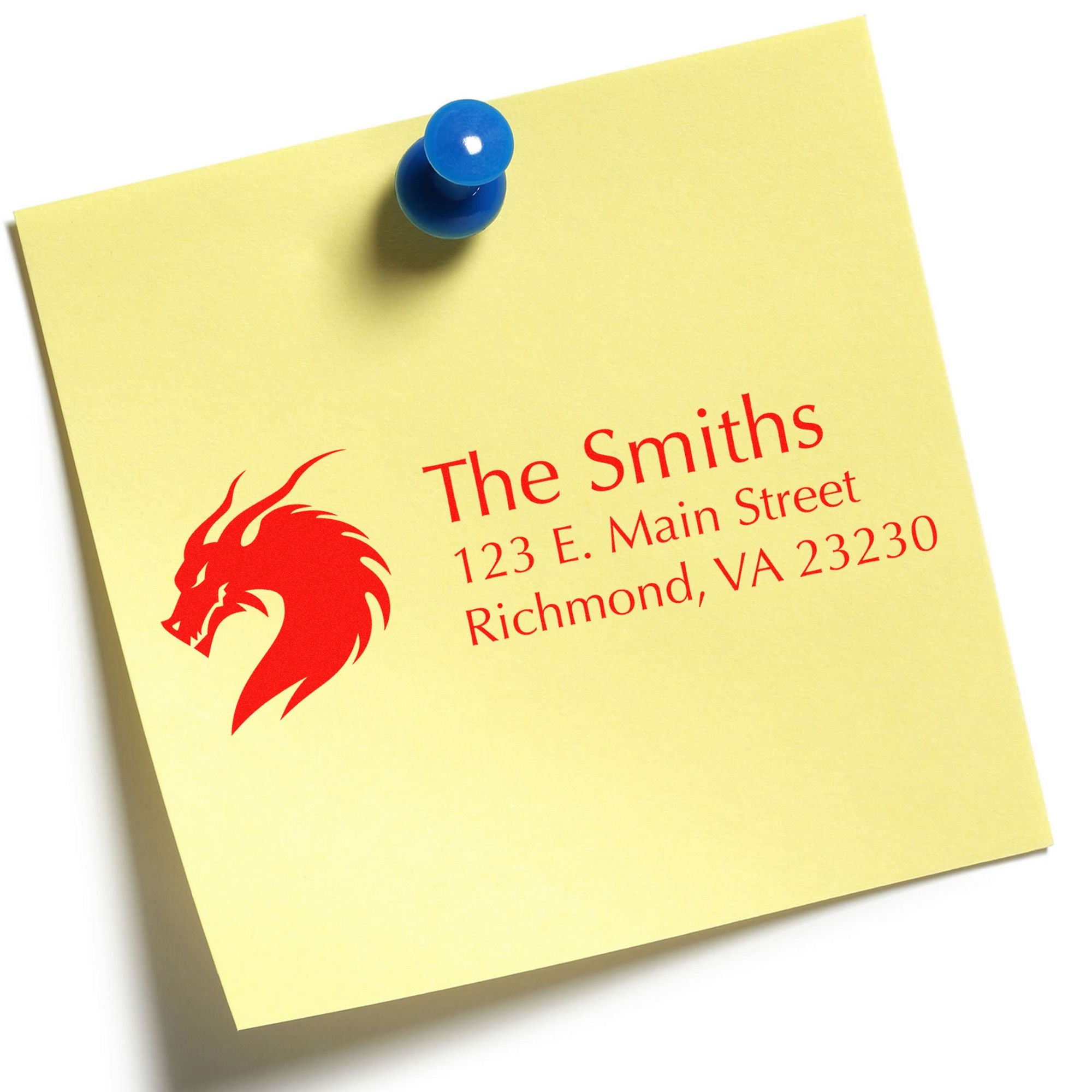Yellow sticky note pinned with blue pushpin, featuring a red custom stamp seal for The Smiths with lion logo and address.