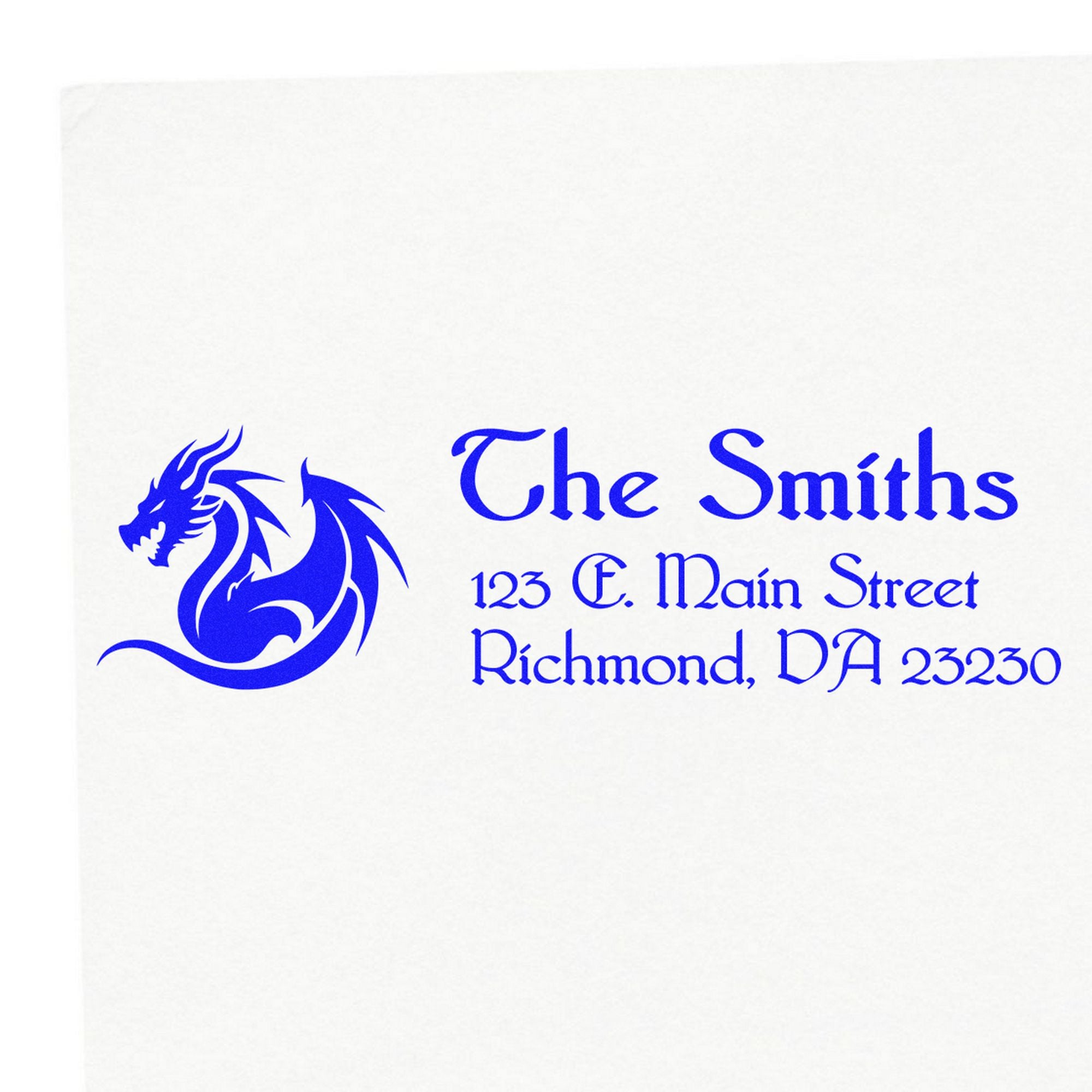 Blue custom self-inking stamp and seal with dragon logo, The Smiths, 123 E. Main Street, Richmond, VA 23230