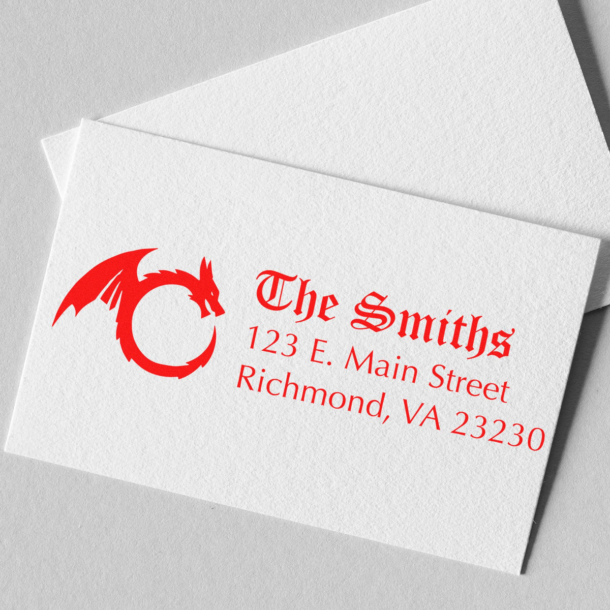 Custom red dragon stamp and seal on textured white stationery, featuring The Smiths and Richmond, VA address.