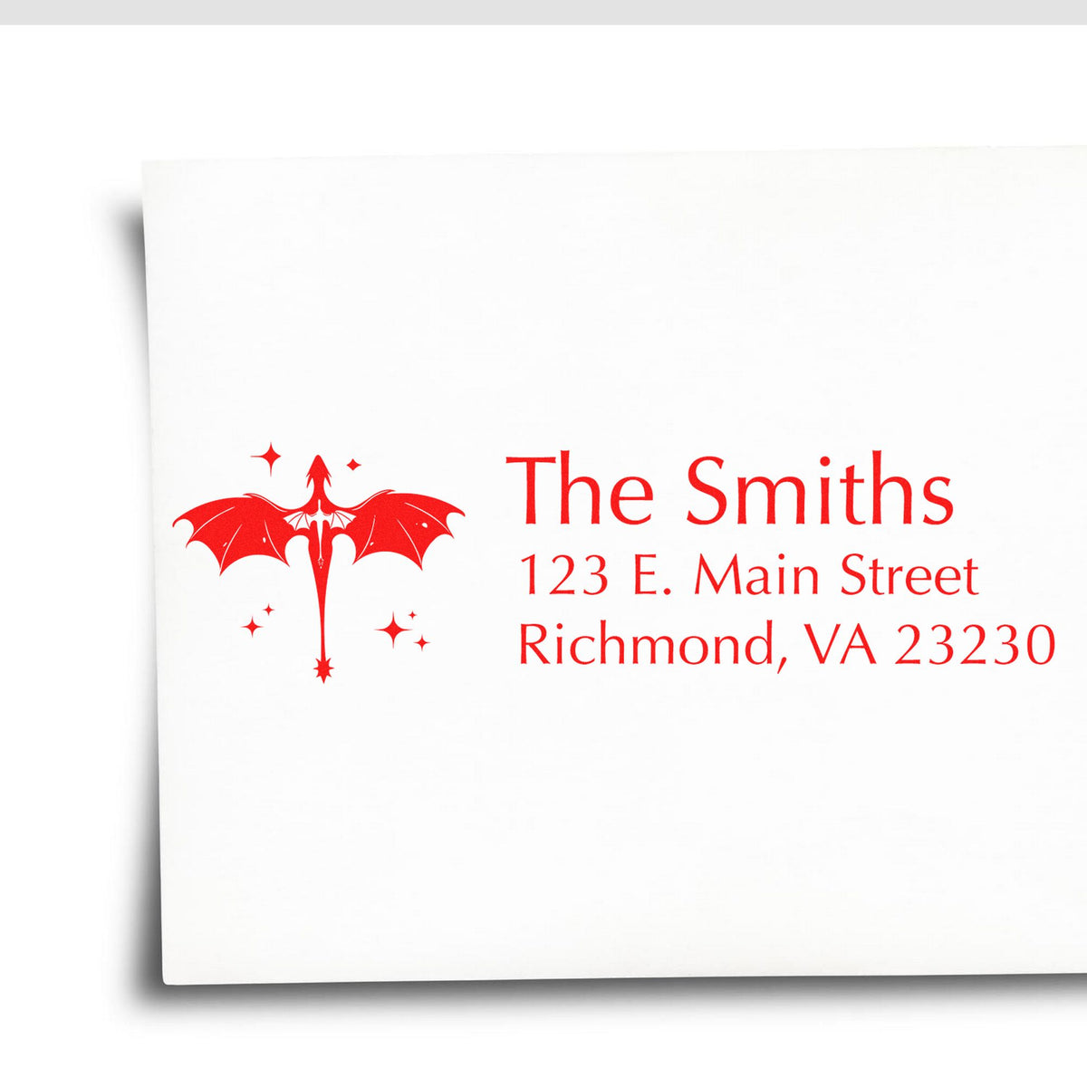White envelope with red custom stamp seal featuring a dragon and The Smiths, 123 E. Main Street, Richmond, VA 23230.