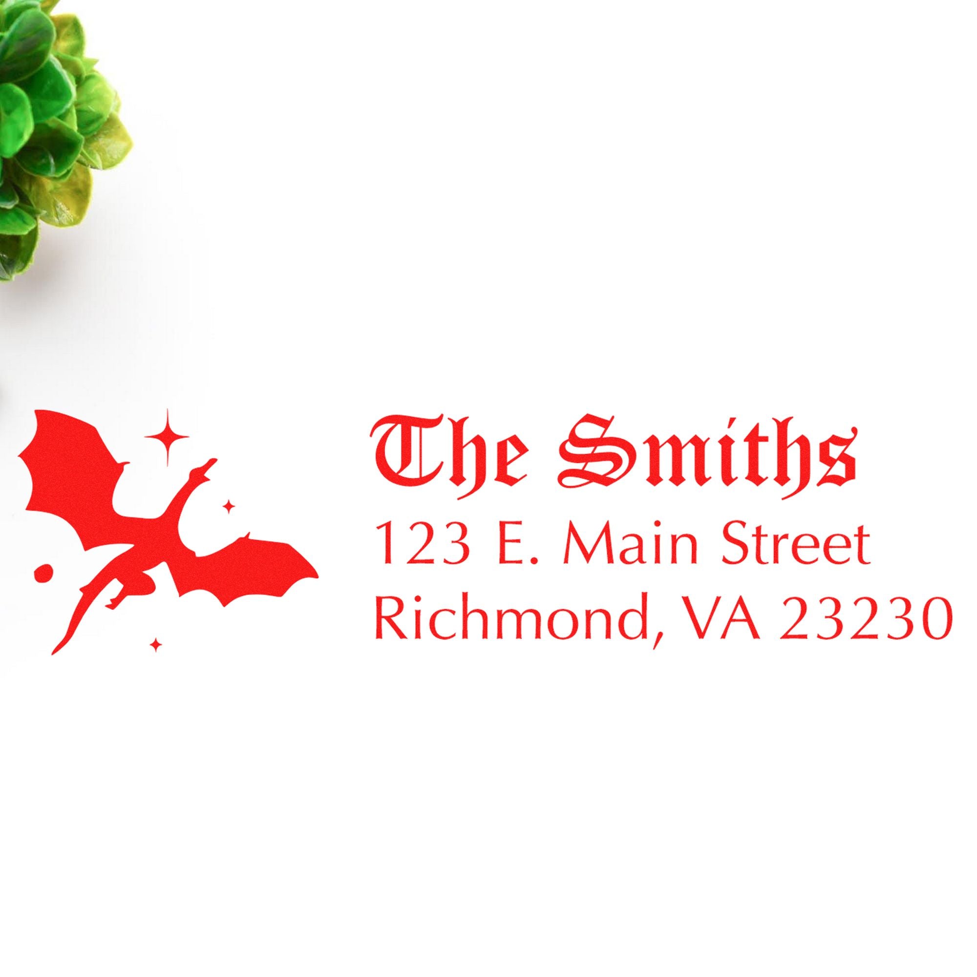 Red custom stamp and seal for The Smiths with address, dragon logo, and green floral accent on white background.