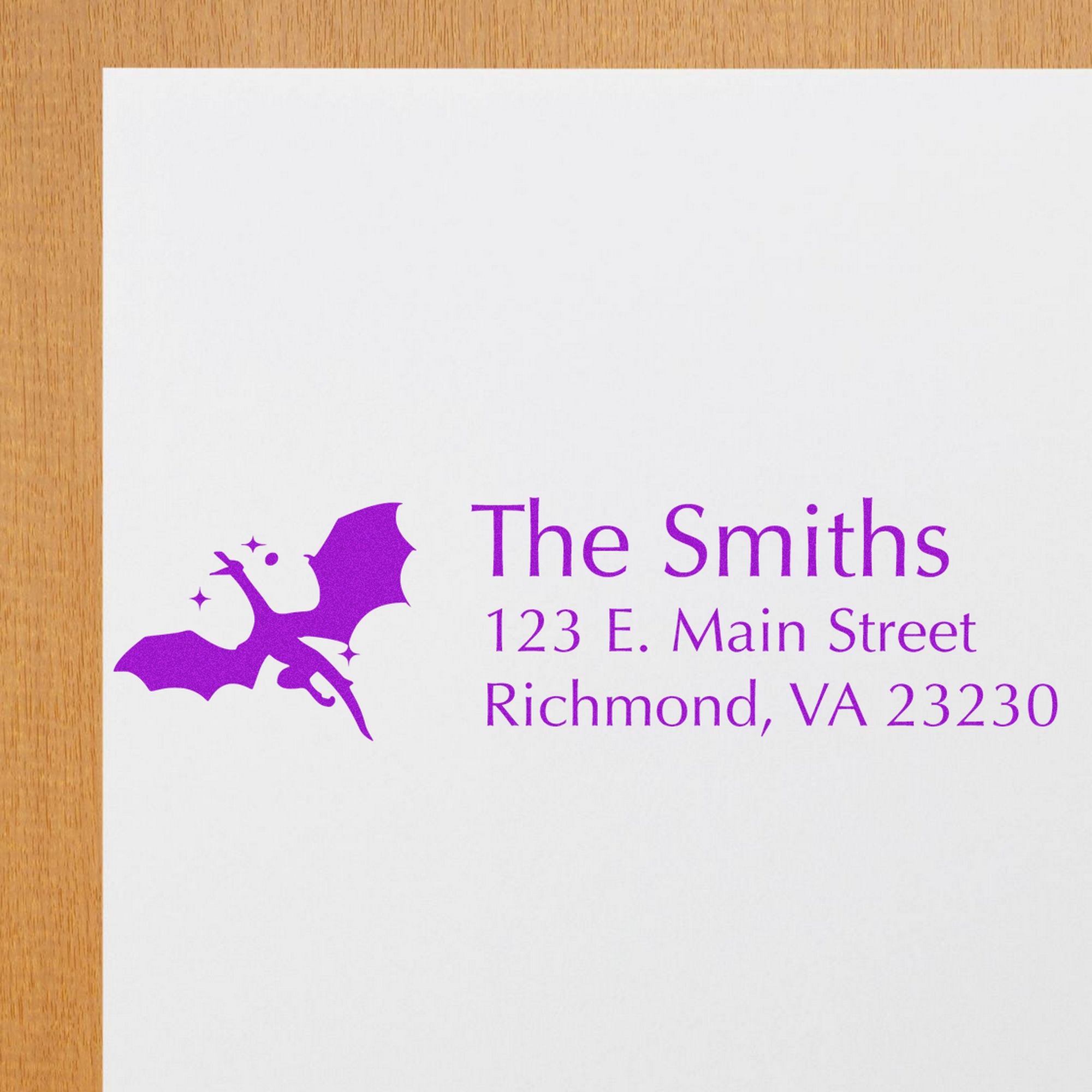 Purple custom stamp and seal for The Smiths, with bat logo and Richmond, VA address on white paper