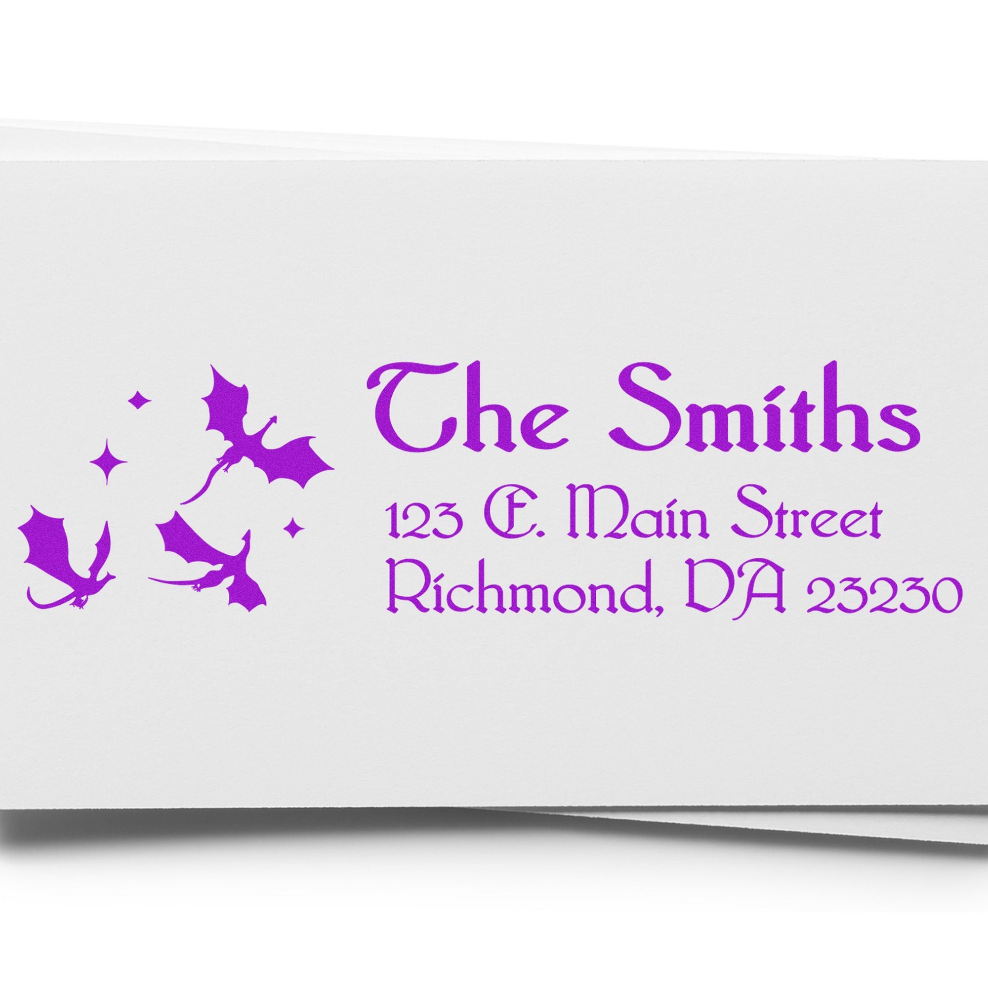 Purple custom stamp and seal with bats, reading The Smiths, 123 E. Main Street, Richmond, VA 23230 on white paper.