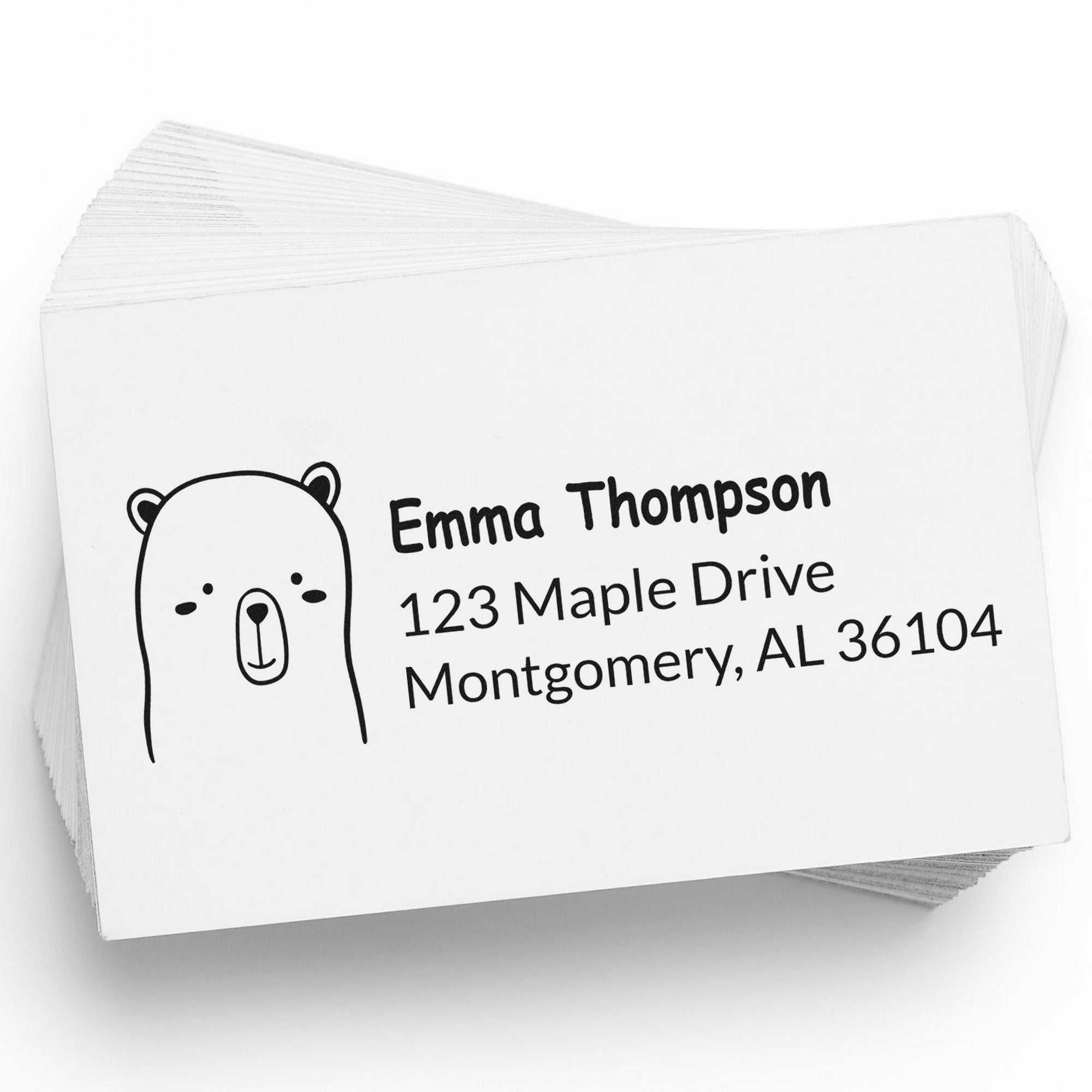 Adorable Bear Customize Mailing Self-Inking Stamp on a stack of cards, featuring a cute bear illustration. The Customizable New Address Stamper displays "Emma Thompson, 123 Maple Drive, Montgomery, AL 36104" in bold, clear text.
