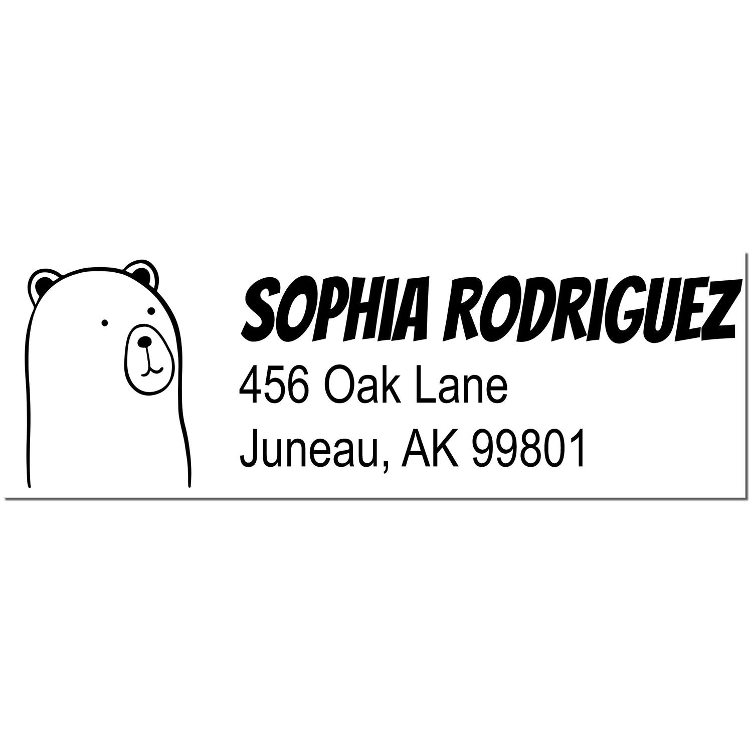 Cuddly Polar Bear Customize Mail Self-Inking Stamp featuring a cute bear illustration. Personalized Return Mail Stamp with the name "Sophia Rodriguez" and address "456 Oak Lane, Juneau, AK 99801" in bold, black text.