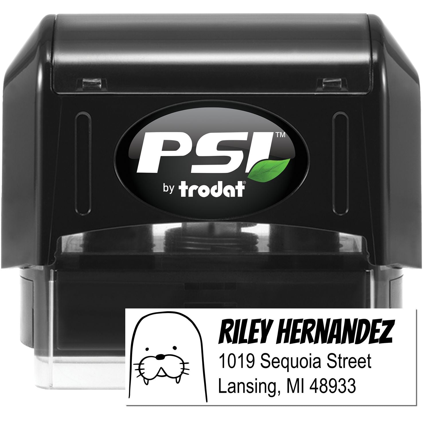 Image of a PSI Wacky Walrus Customize Mailing Pre-Inked Stamp featuring a personalizable new address stamper design. The stamp displays the name "Riley Hernandez" with an address and a walrus graphic, set against a black casing with the PSI logo.