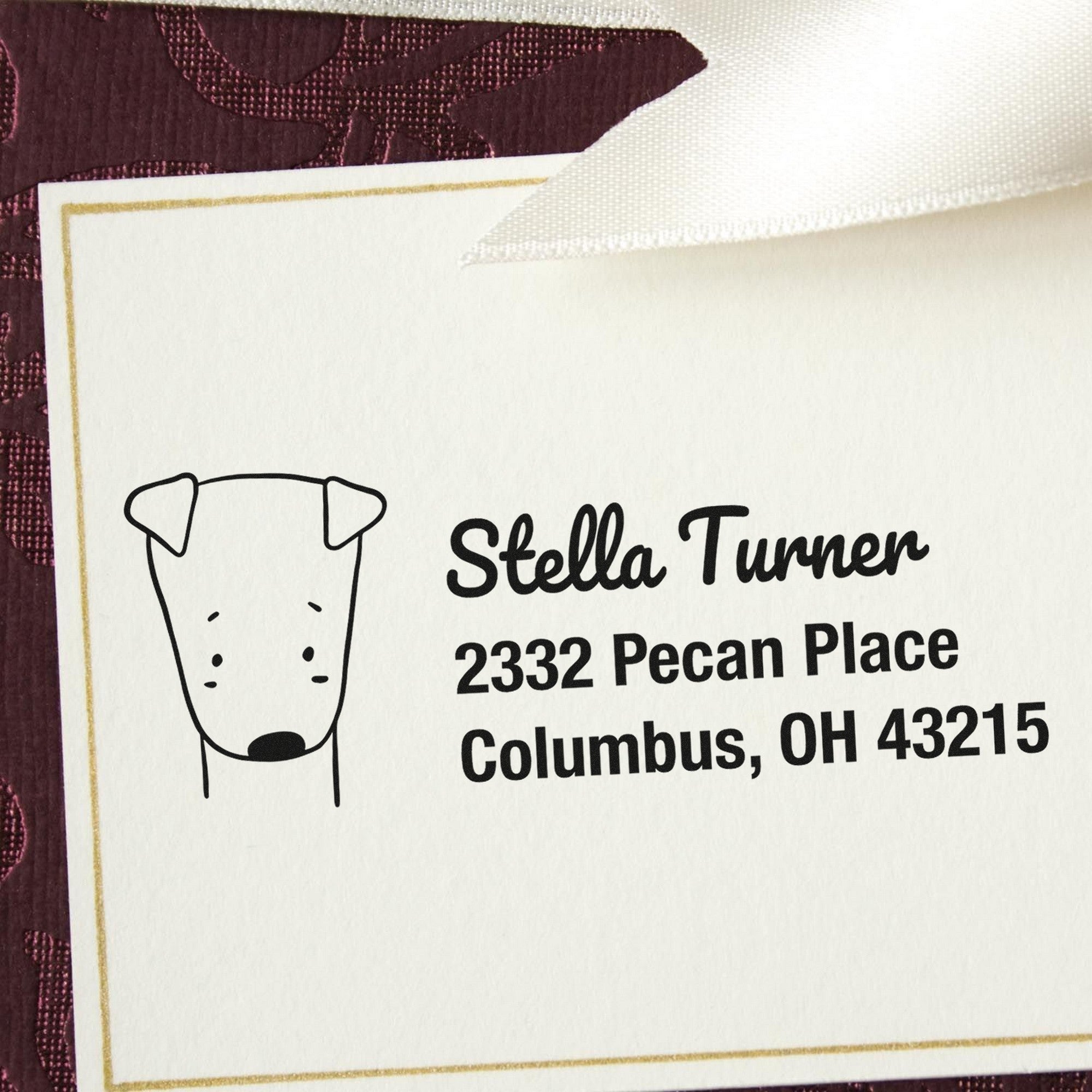 Darling Dog Custom Return Address Self-Inking Stamp featuring a simple dog illustration and customizable home stamp with the name Stella Turner and address 2332 Pecan Place, Columbus, OH 43215 on a decorative background.