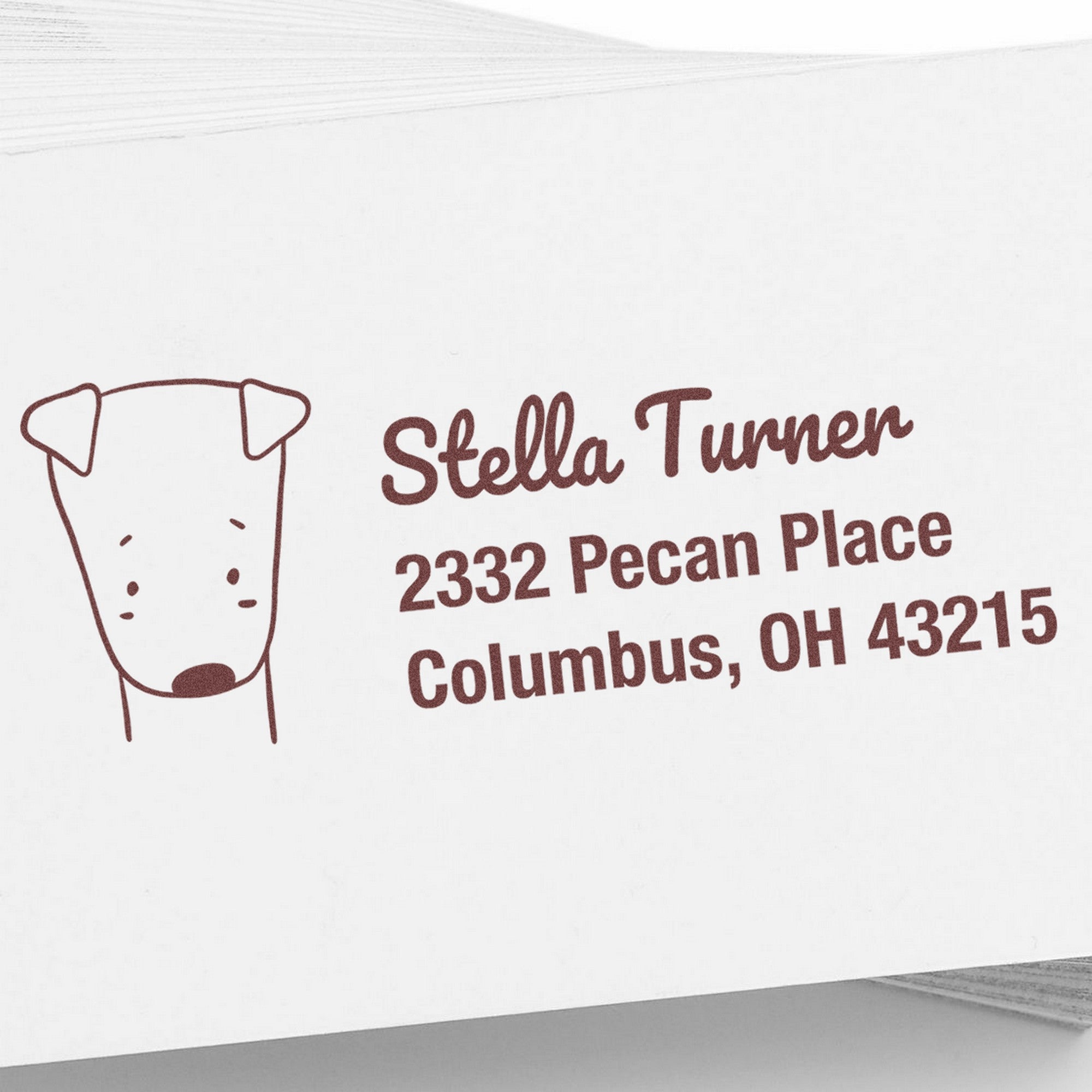 Wood handle darling dog customized home address for envelopes rubber stamp featuring a cute dog illustration and the text "Stella Turner, 2332 Pecan Place, Columbus, OH 43215." This custom-made new address stamp is perfect for personalizing mail.