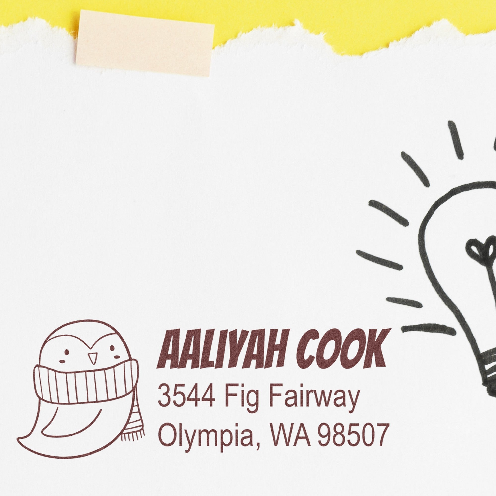 PSI Pretty Penguin Personalized Mail Pre-Inked Stamp featuring a cute penguin in a scarf, with the name "Aaliyah Cook" and address "3544 Fig Fairway, Olympia, WA 98507" on a white envelope. Ideal for personalized mailing stamp needs.