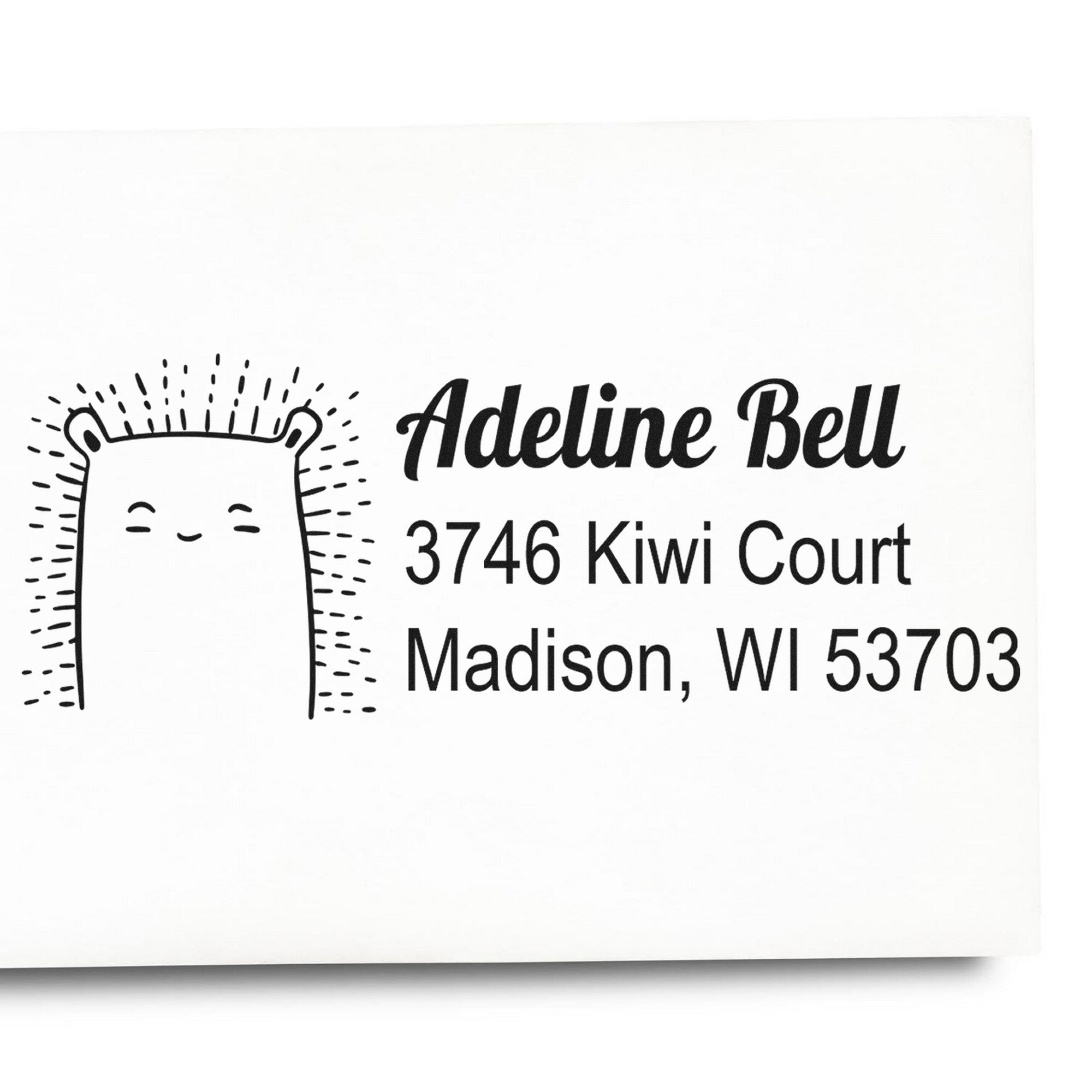 PSI Bouncy Bear Personalized Address Return Pre-Inked Stamp featuring a cute bear design with the name Adeline Bell and address 3746 Kiwi Court, Madison, WI 53703. This Personalized Address Stamper adds charm to envelopes.