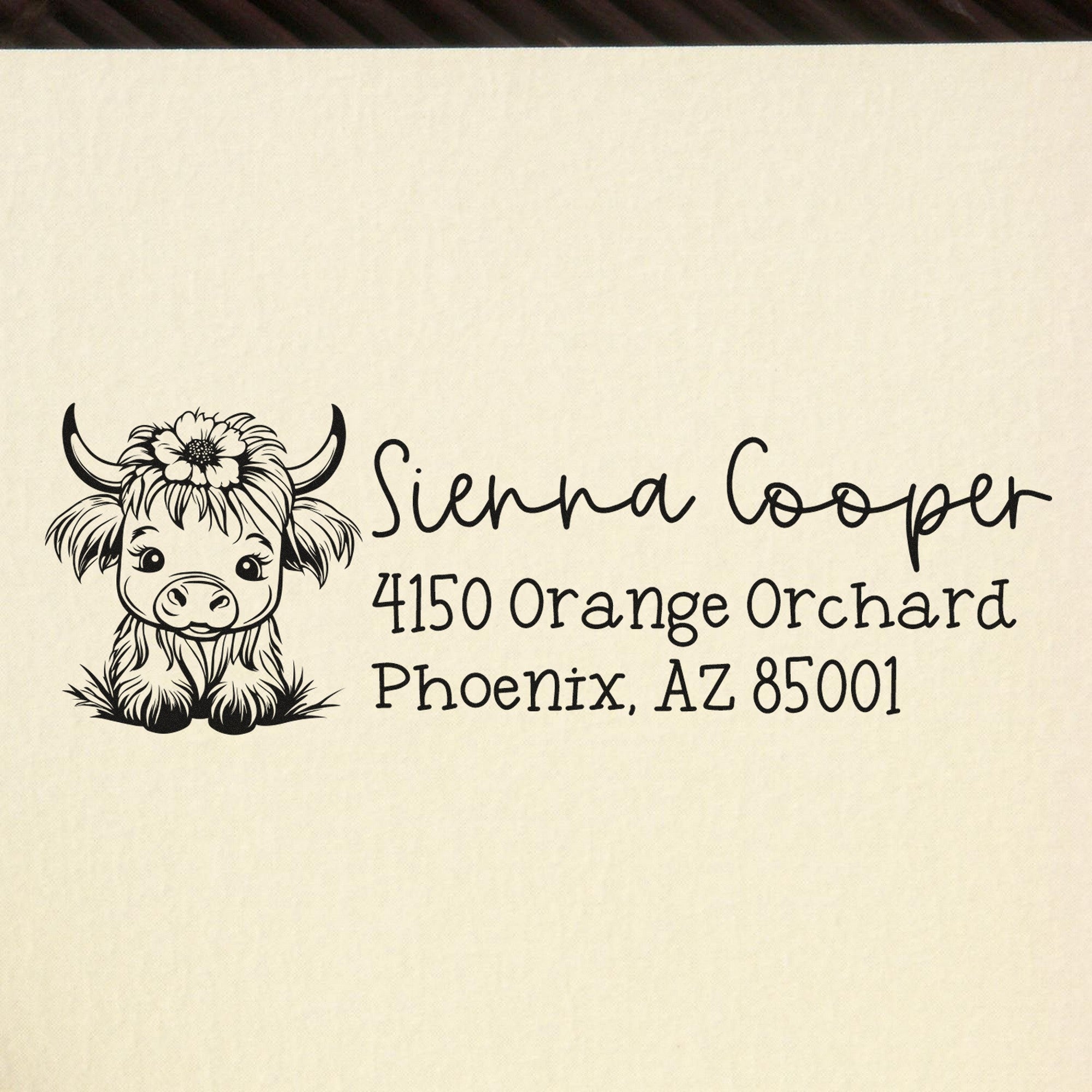 Black custom stamp and seal design with cow and flower logo, Sierra Cooper, Phoenix, AZ address on cream background.