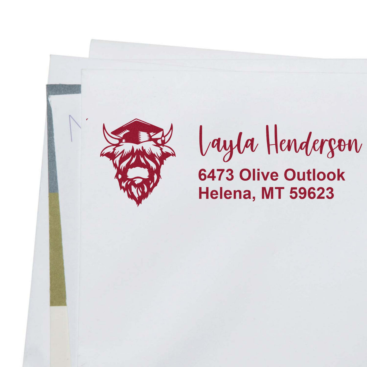 White envelopes with burgundy custom stamp/seal featuring a bison logo and Layla Henderson return address, Helena, MT.