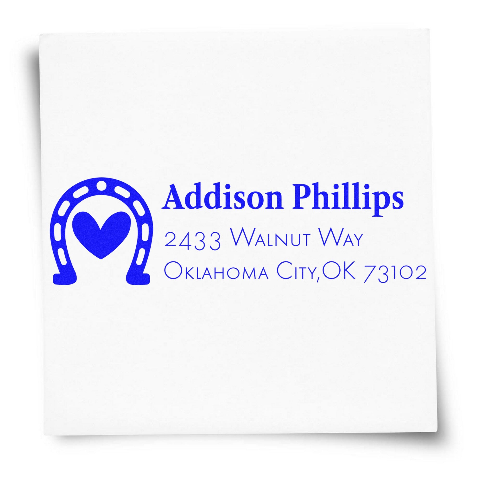 Blue custom stamp and seal with horseshoe heart logo, Addision Phillips name, and Oklahoma City address on white background