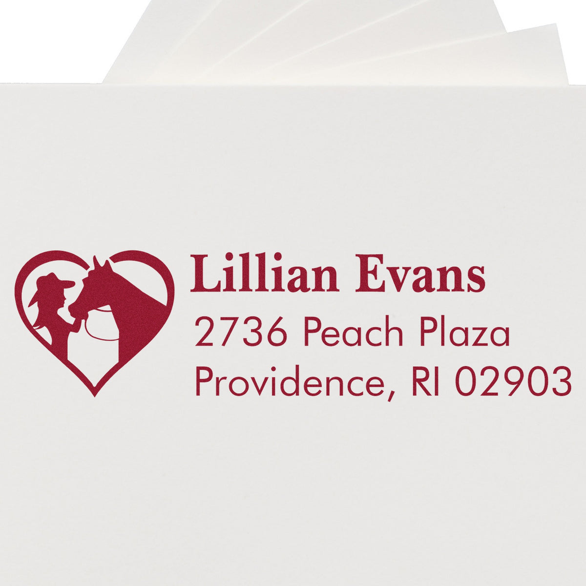 White envelope with burgundy custom stamp and seal design, heart-shaped horse logo, and Lillian Evans address.
