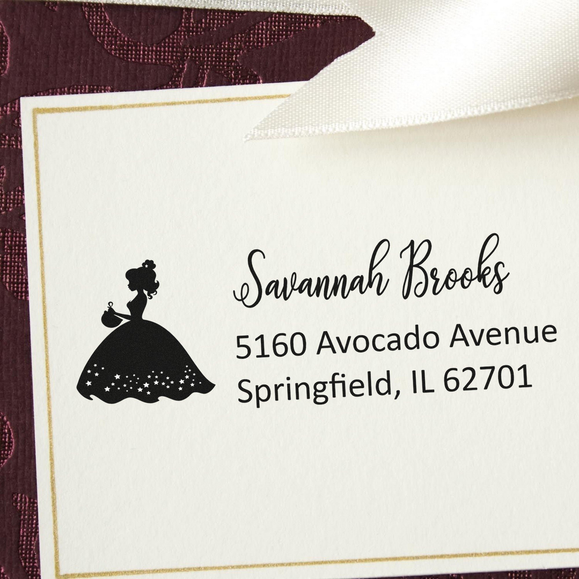 Personalized stamp and seal card with black princess silhouette, gold border, and white background.