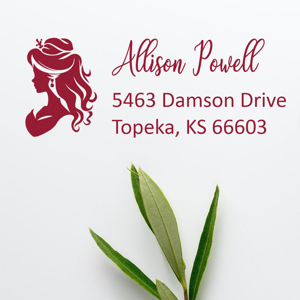 Burgundy custom stamp and seal with feminine silhouette logo, Allison Powell address, on white with green leaves.