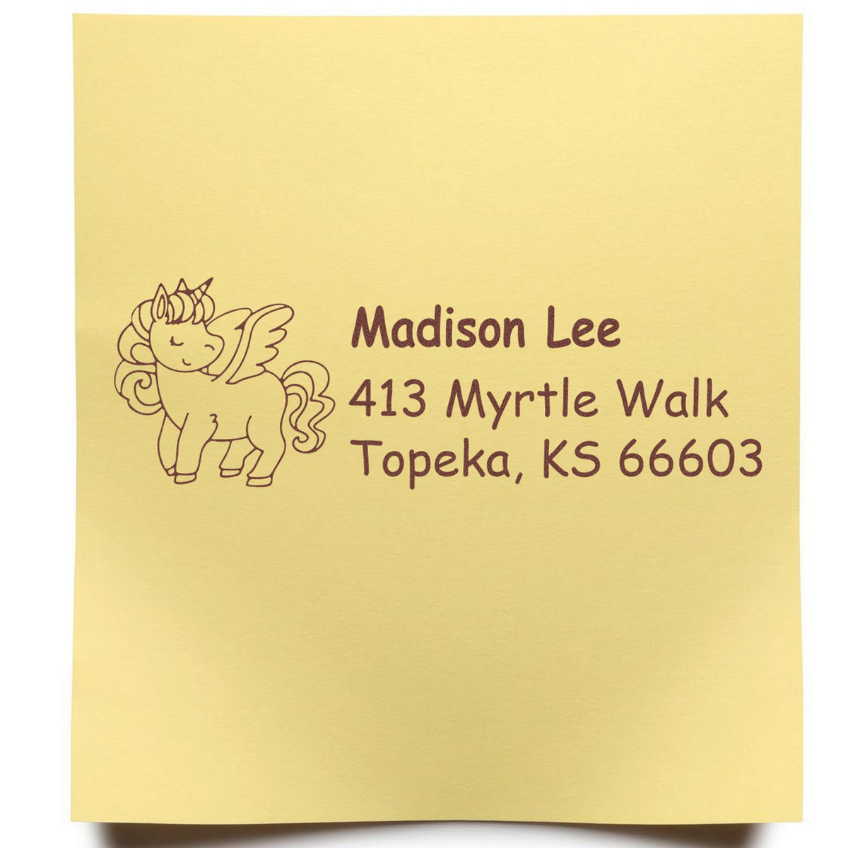 Gold metallic custom address stamp with brown unicorn seal, Madison Lee, 413 Myrtle Walk, Topeka, KS 66603.