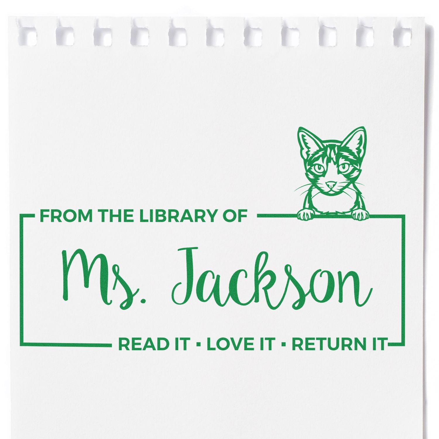 Green custom library stamp seal on white paper with cat and From the Library of Ms. Jackson plus Read it Love it Return it.