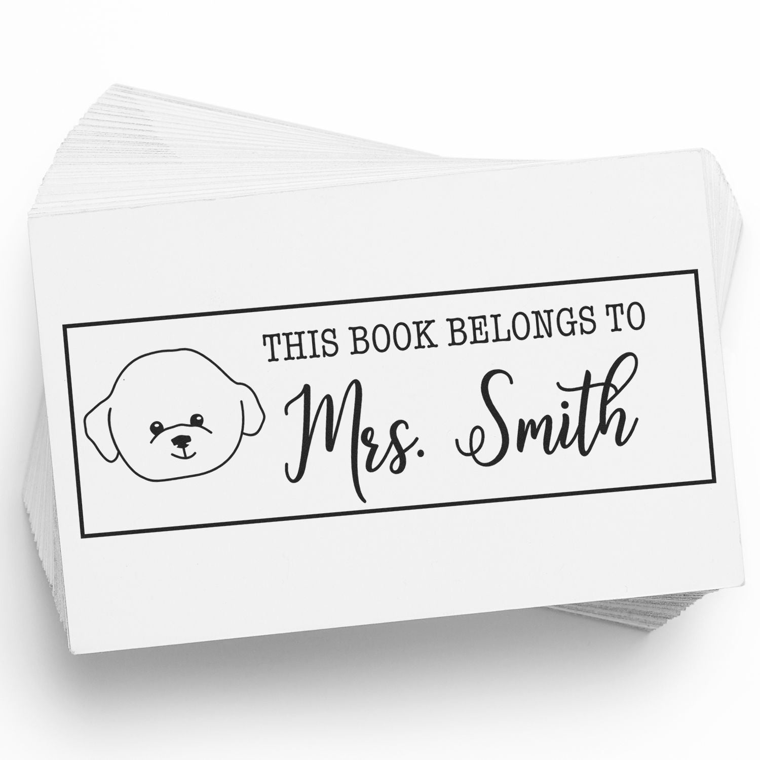 Black-and-white custom book stamp and seal with dog icon and This Book Belongs to Mrs. Smith text.