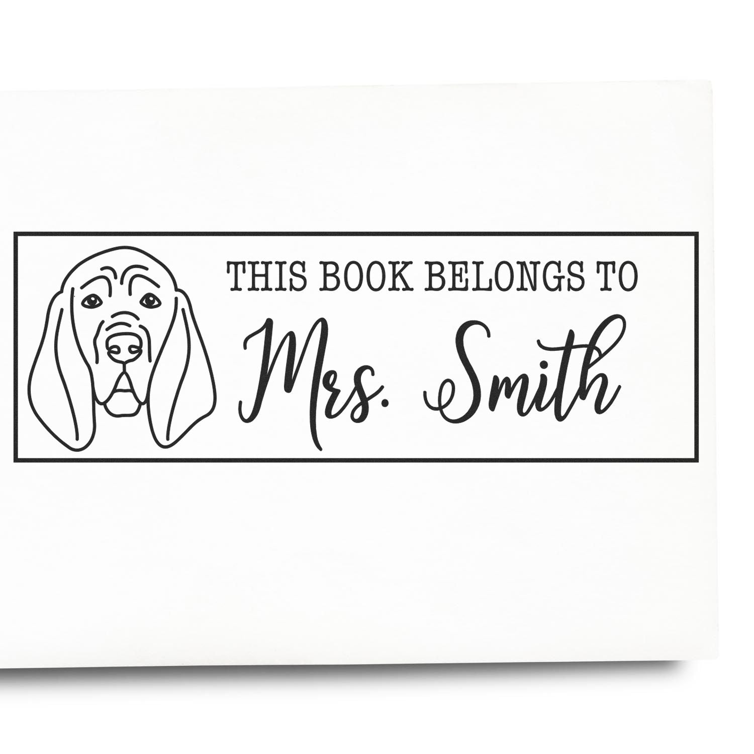 Black personalized book ownership stamp and seal with dog illustration and This Book Belongs to Mrs. Smith on white.