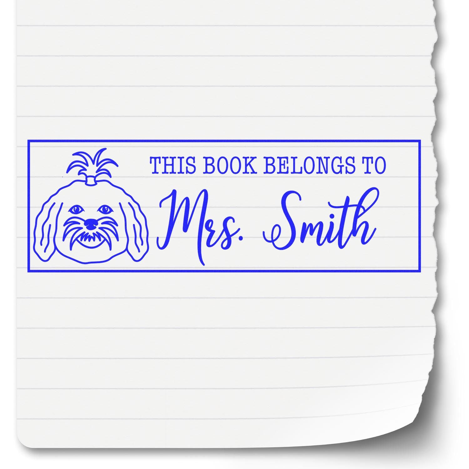 Blue custom book stamp seal with dog icon and This Book Belongs to Mrs. Smith on lined white paper.