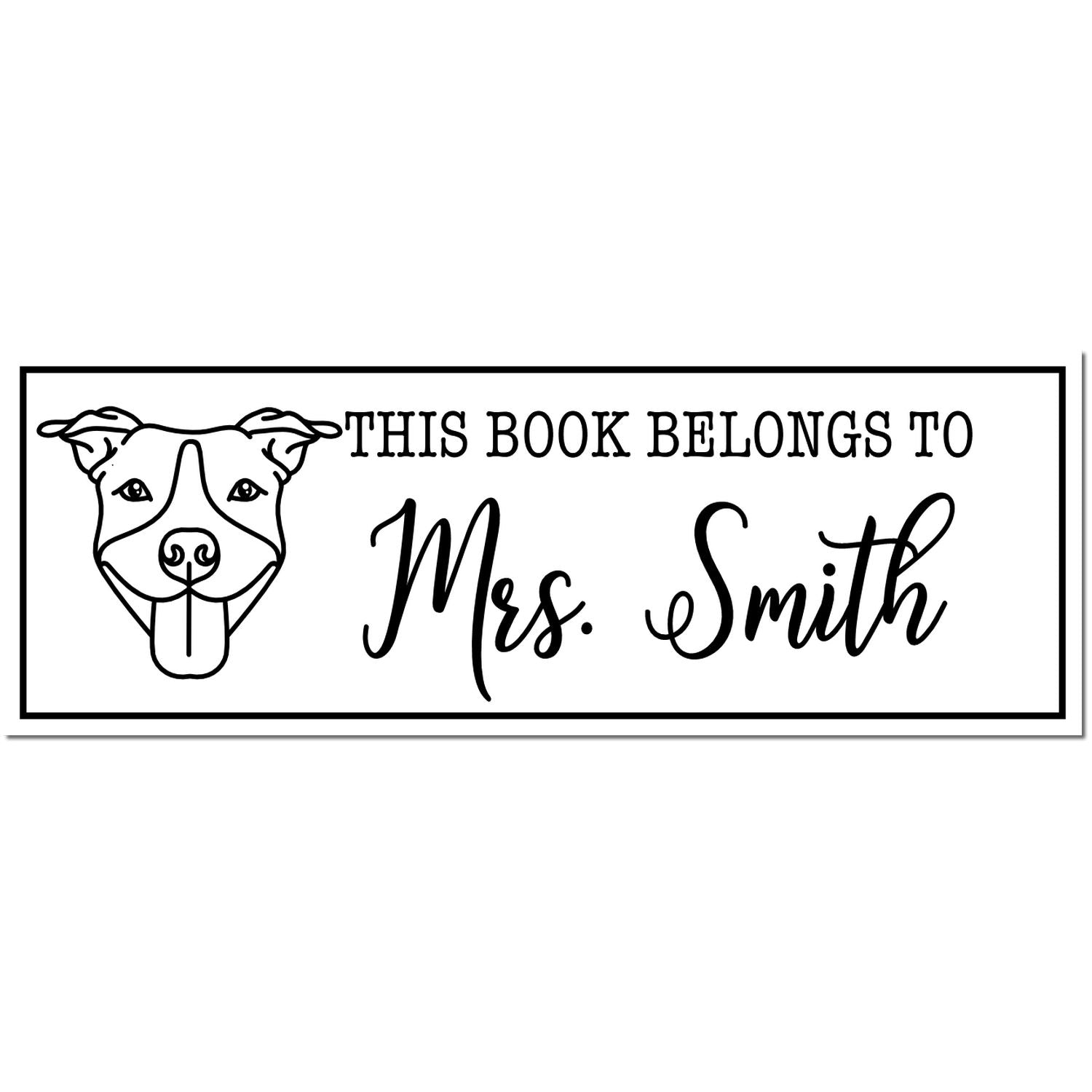 Black-and-white self-inking book stamp with dog illustration and This Book Belongs to Mrs. Smith inside a bordered rectangle.