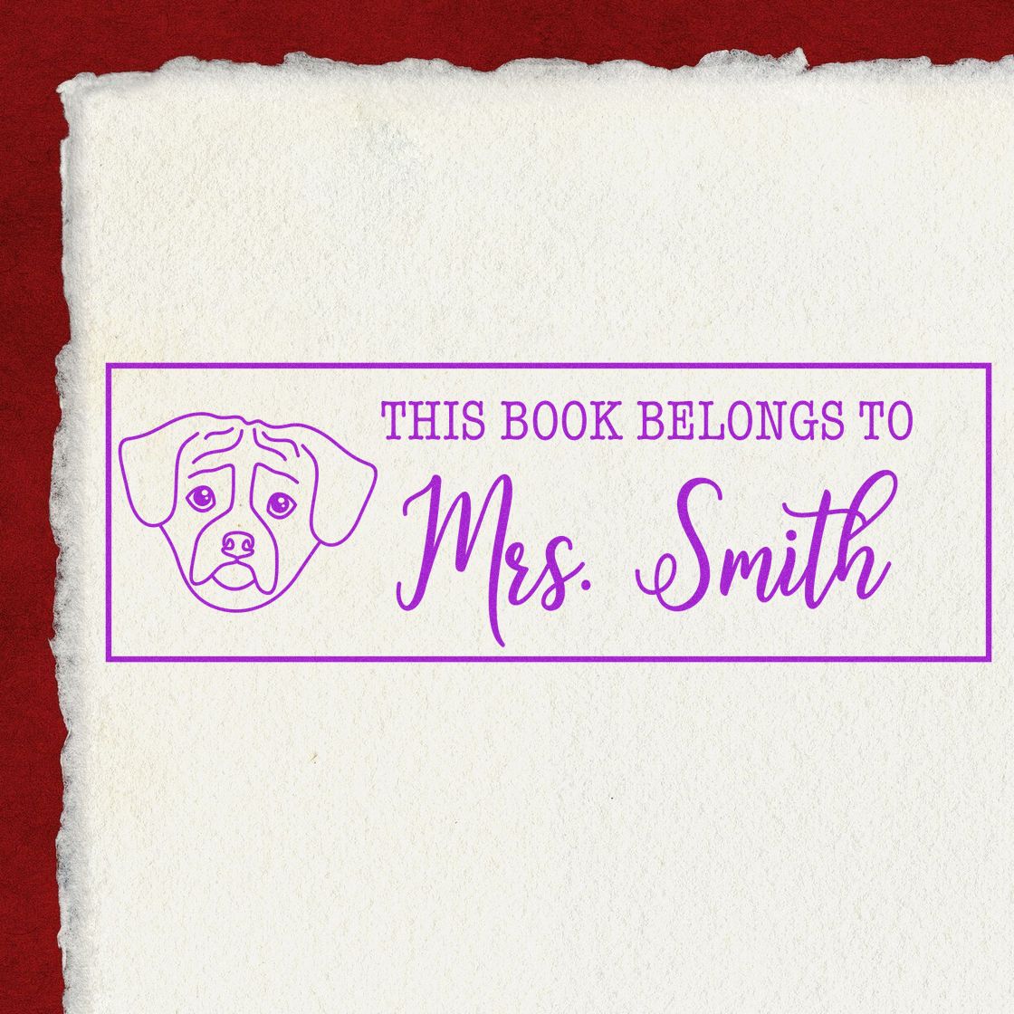 Purple custom bookplate stamp with dog outline and This book belongs to Mrs. Smith on textured paper.